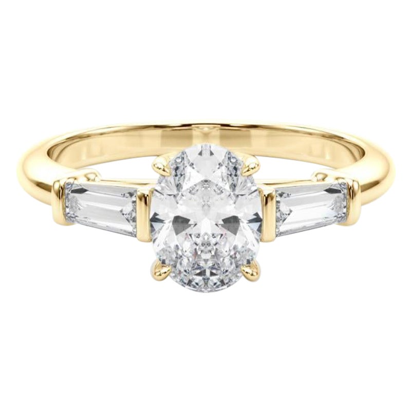 Bague à trois pierres en diamant ovale et baguette de 2,01 carats certifiée par le GIA