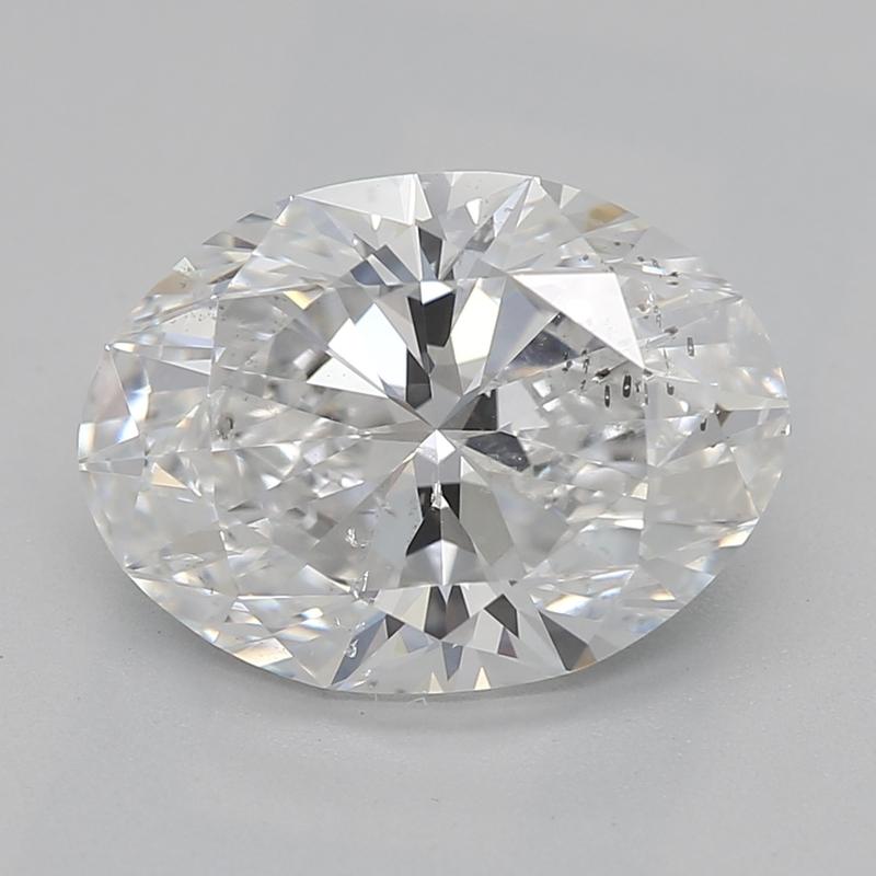 Fabriquée à la main à New York, cette époustouflante bague en diamant est ornée d'une superbe pierre centrale ovale E SI2 pesant 2,01. Le design est caractérisé par un motif tulipe dimensionnel qui embrasse avec art le diamant de taille ovale,