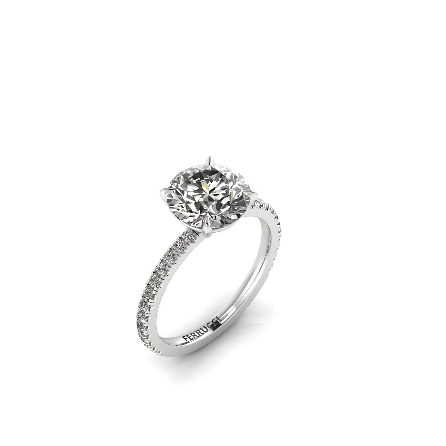 GIA Certified 2.39 Carat Round Diamond J color SI1 Clarity in Platinum 950.
White diamonds pave on the shank for a total of approximate 0.28 carats.
This stunning diamond ring is a low setting style.

Ring size 5  3/4 complimentary adjustable to