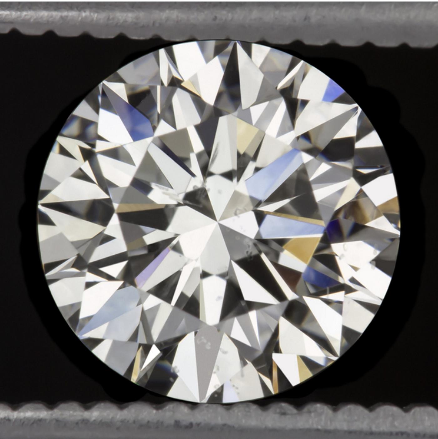 Amazing 2 carat GIA certified triple excellent diamond is beautifully white, 100% eye clean, and displays absolutely phenomenal sparkle! This diamond was hand selected because it is completely eye clean, proper J color without any undertones or
