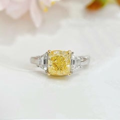 GIA Certified 2.01 CT Fancy Light Yellow Diamond Three-Stone Ring