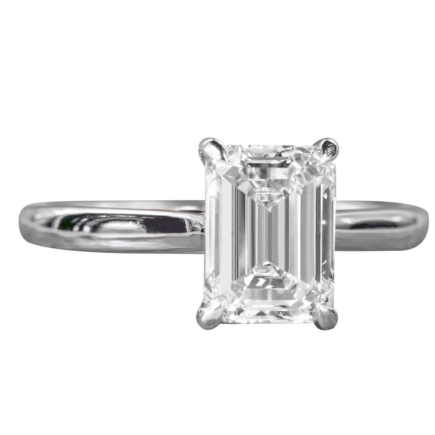 This elegant ring features a GIA-certified 2.01-carat natural emerald cut diamond, set in a timeless platinum setting. The diamond is graded I color and SI2 clarity, with very good polish and good symmetry, delivering impressive brilliance with a