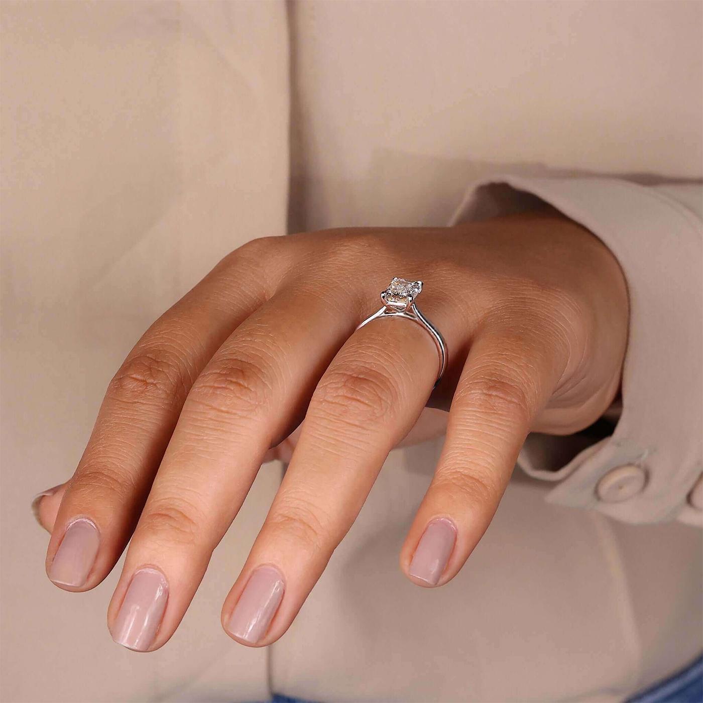 Women's GIA Certified 2.01ct Emerald Cut Diamond Engagement Ring in 4 Prong Platinum For Sale