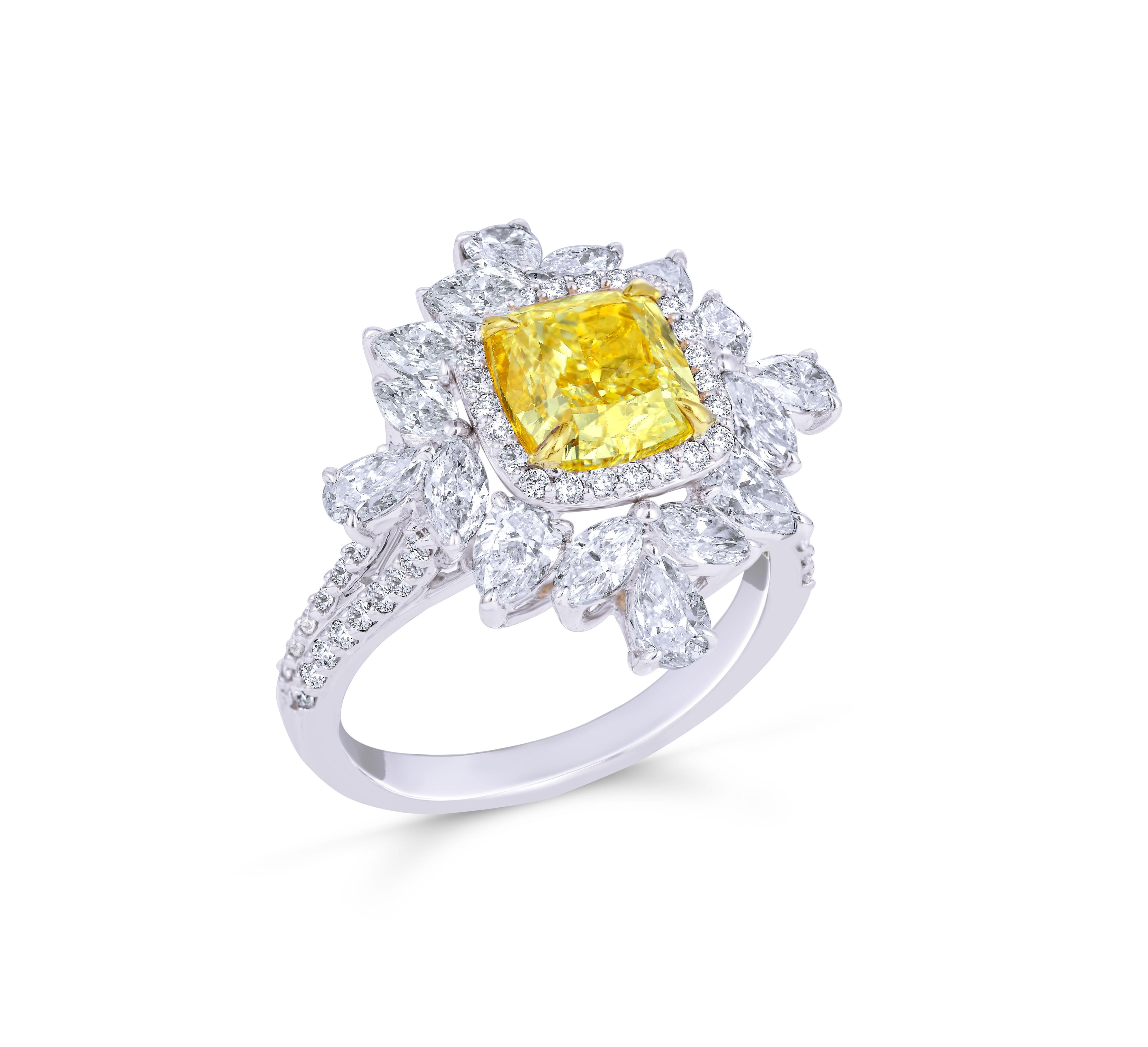 Beautiful cushion yellow diamond ring with white pear, marquise & round diamonds. 2.01ct yellow cushion diamond in the centre completes the look of this gorgeous solitaire ring.

Made exclusively at the state of the art, P Hirani Jewelry Atelier &