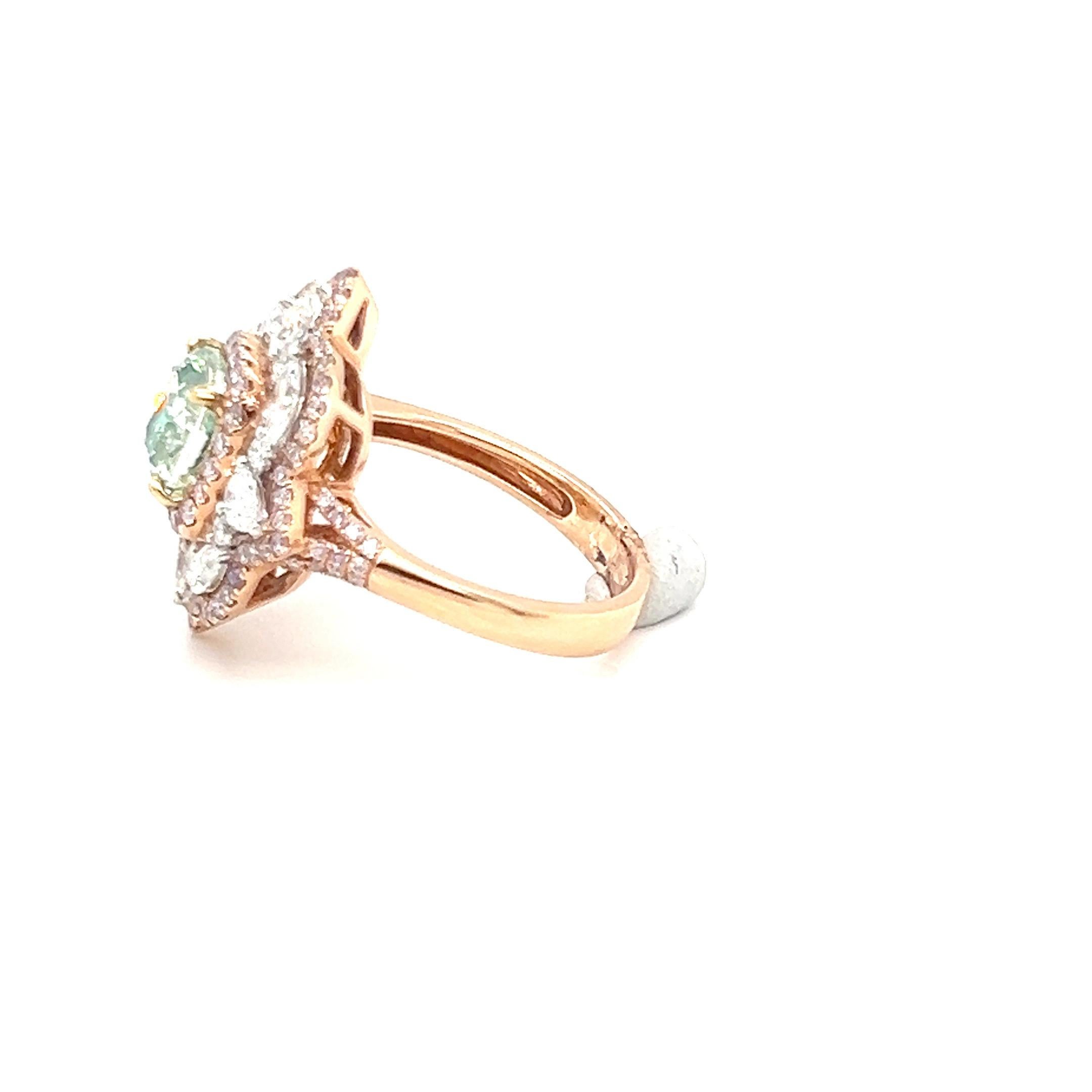This GIA-certified 2.02-carat cushion-cut green diamond ring is beautifully styled in a floral motif, offering a sophisticated and elegant look. The green diamond, a highly sought-after color in the diamond world, is encircled by a dazzling array of