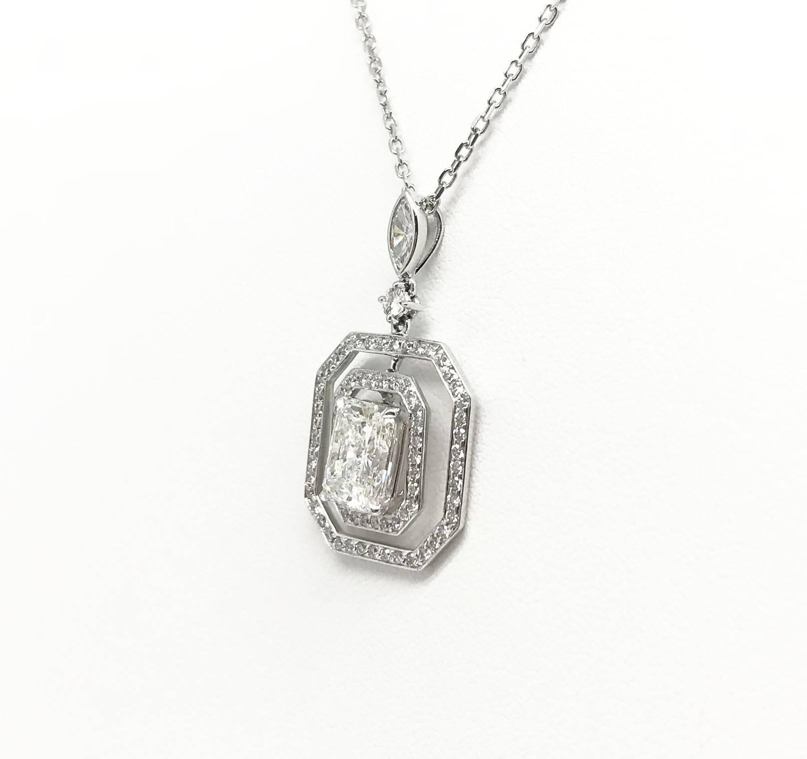 This item is another perfect gift for her everyday wear or special occasions. The pendant features a H Colour Internally Flawless 2.02 carat cut-cornered rectangular shape diamond, and is accompanied by small diamonds weighing 0.61 carat. The