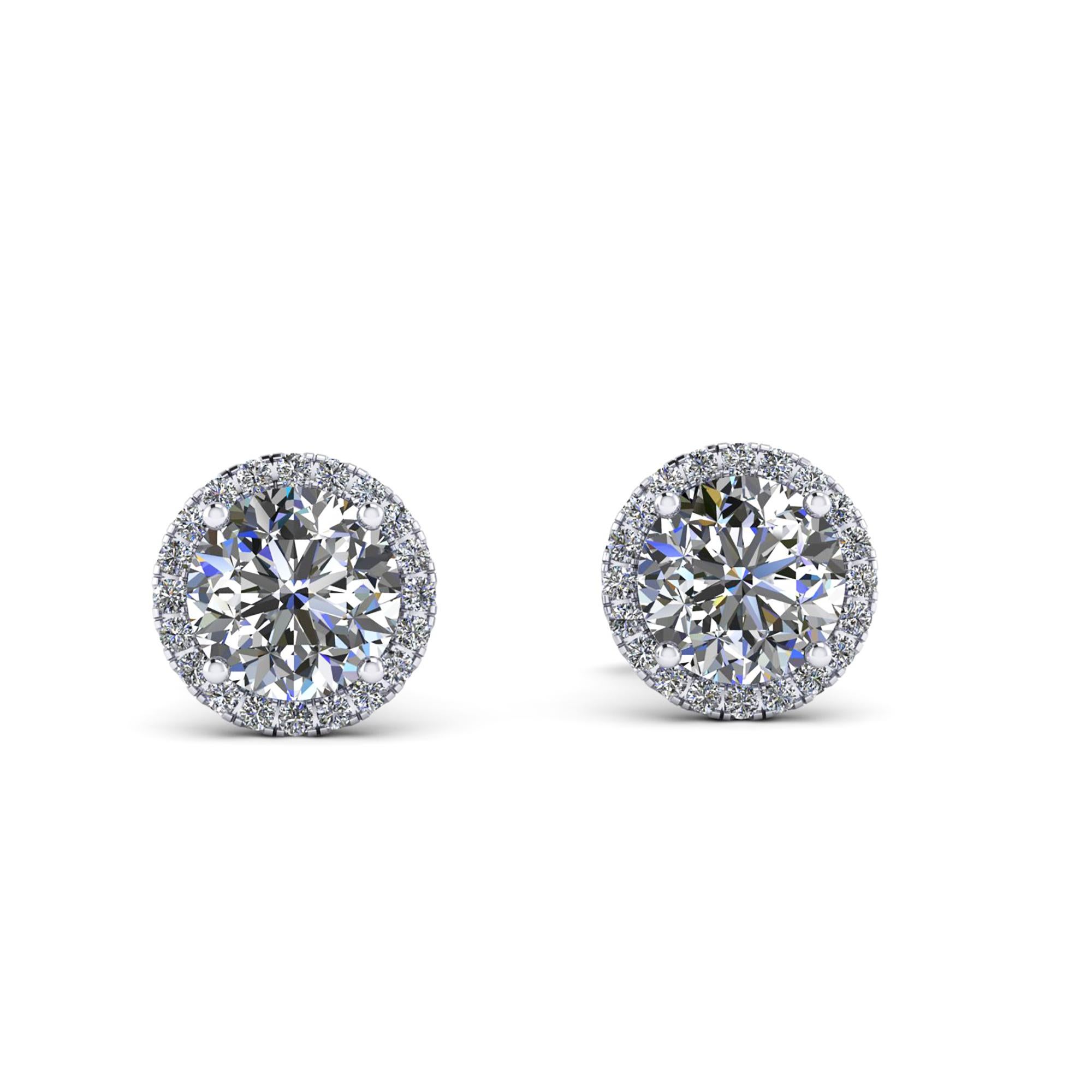 GIA Certified 2.02 Carat Diamond Halo Studs earrings hand made in Platinum in New York City with the best Italian craftsmanship
two brilliant round diamonds, H color, VS clarity of 1.01 carat and 1.01 carat, the diamond halos enhancing the diamonds