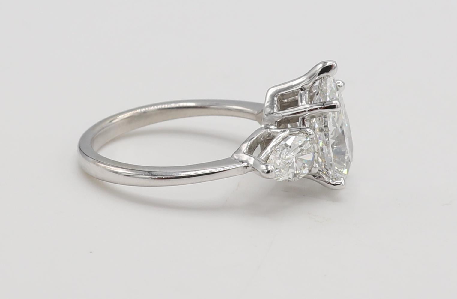 Pear Cut GIA Certified 2.02 Carat F SI2 Pear Shape Diamond Three Stone Engagement Ring