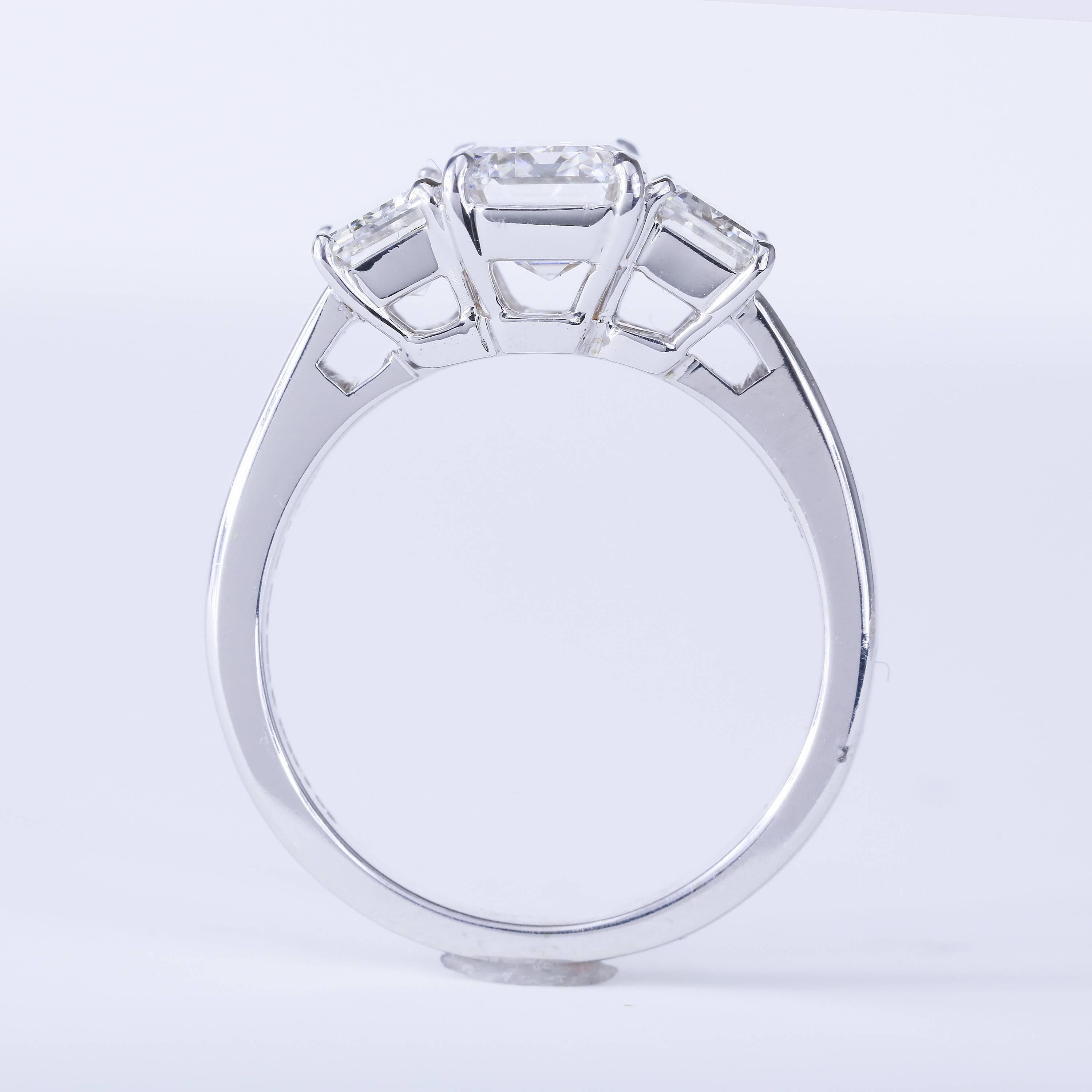 GIA Certified 2.02 Carat G VS2 Emerald Cut Three-Stone Ring 18 karat White Gold In New Condition For Sale In Chicago, IL