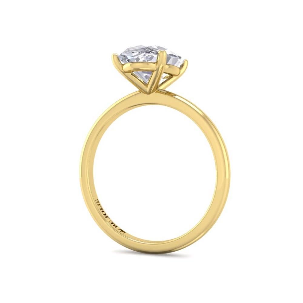 Handcrafted Solitaire Engagement Ring centers a 2.02 Carat oval cut diamond  E / VVS1 and mounted on 18K Yellow Gold. 
Oval Diamond dimensions: 10.01 mm x 6.98 mm x 4.28 mm
Ring Size 6.5 and can be resized. 
Our ring is custom made. Since beautiful