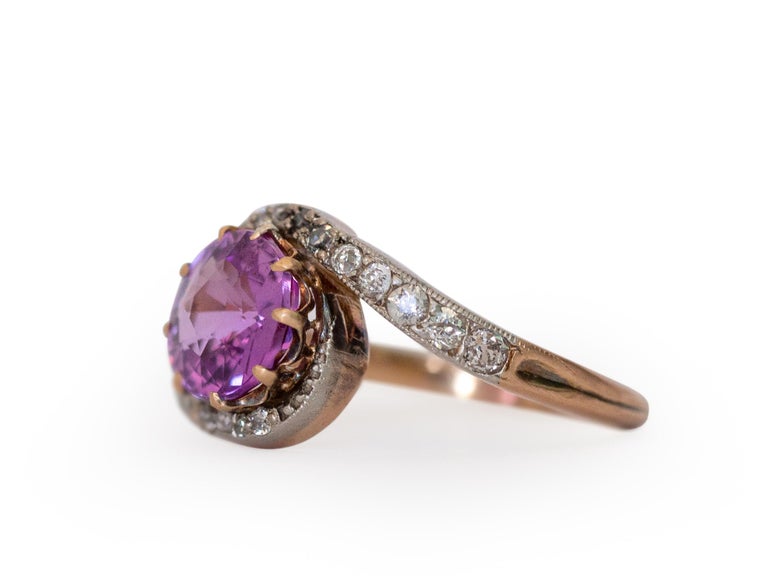 Ring Size: 4.75
Metal Type: 14K Yellow Gold & Platinum  [Hallmarked, and Tested]
Weight:  3 grams

Center Sapphire Details:
GIA REPORT #: 5211093725
Type: Natural, Unheated. 
Weight: 2.02 carat
Cut: Transitional Round, Modified
Color: Intense Purple