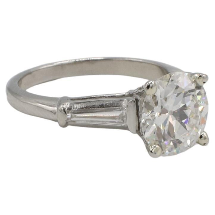 GIA Certified 2.02 Carat Circular European I SI1 Natural Diamond Engagement Ring 

GIA report number: 2235514460
Diamond: 2.02 carat I SI1 circular brilliant natural diamond
Accent diamonds: 2 tapered baguette natural diamonds, approx. .40 CTW G