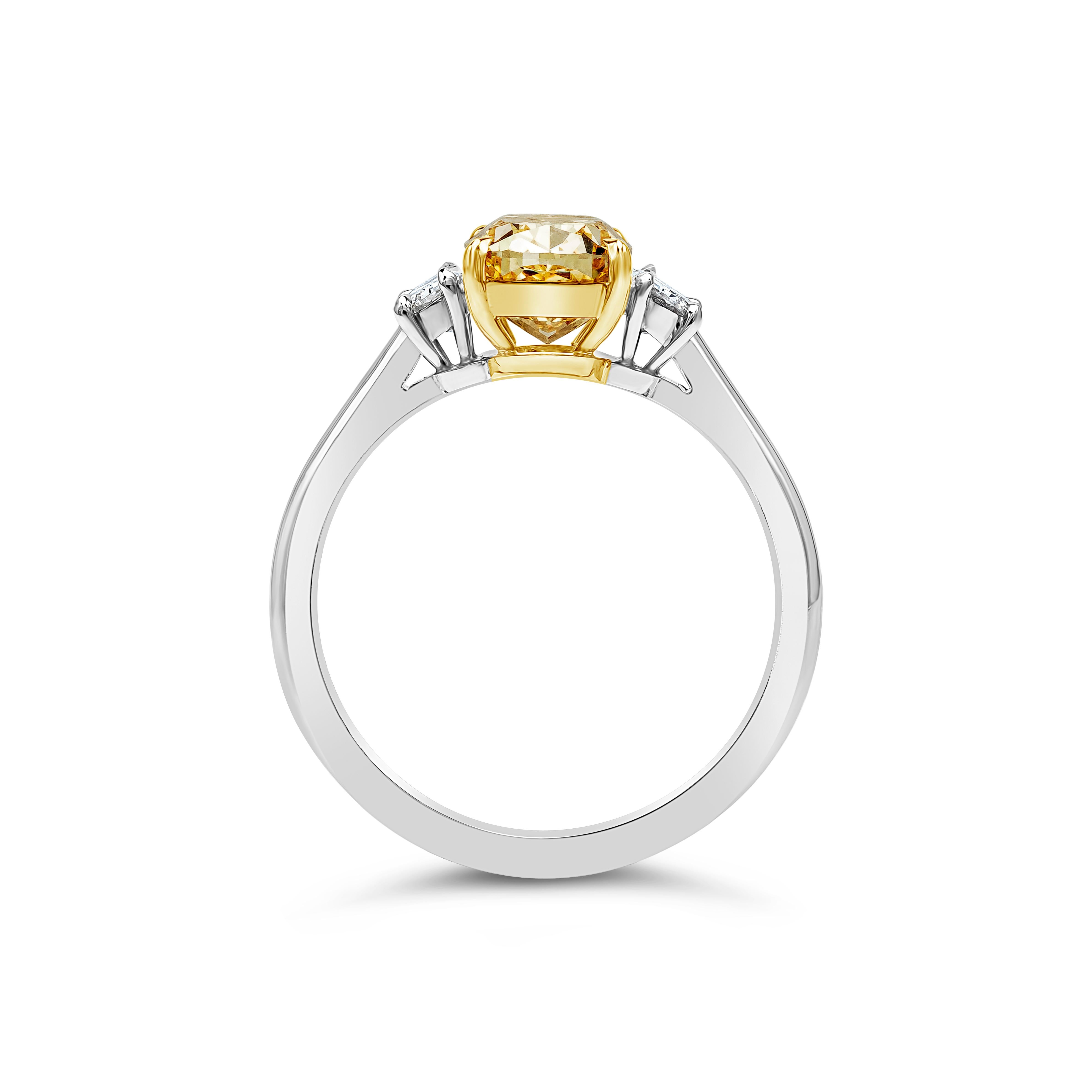 Contemporary 2.03 Carats Fancy Intense Yellow Diamond Three-Stone Engagement Ring For Sale