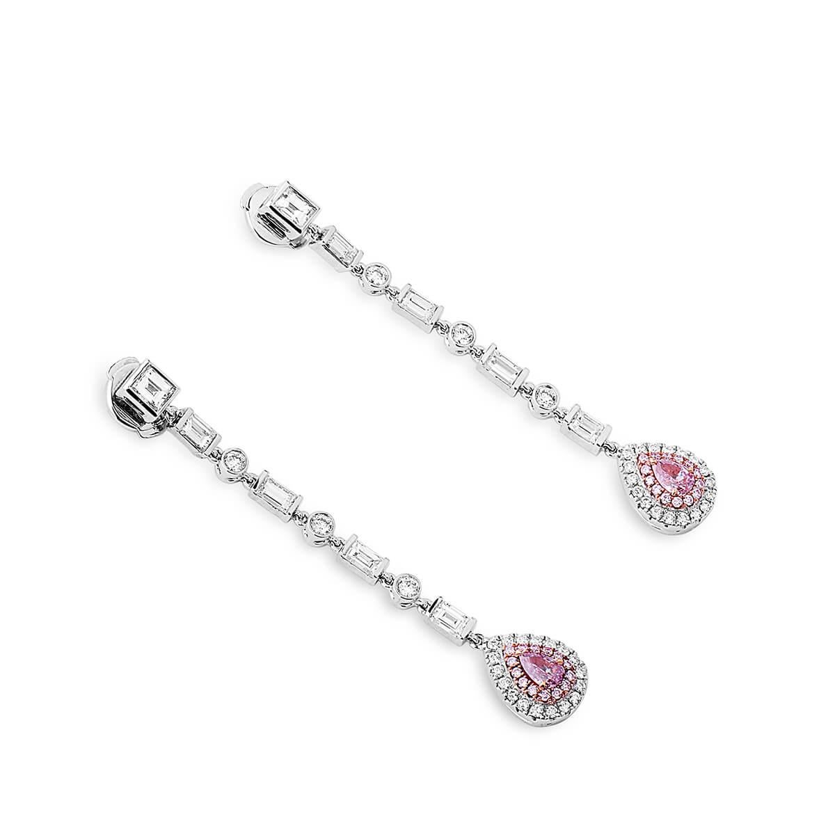 This sophisticated yet playful pair of earrings consist of two pink diamonds that are 0.38 carats, they are complimented by falling natural white diamonds of different shapes making up a total carat weight of 2.03. They are GIA Certified and have