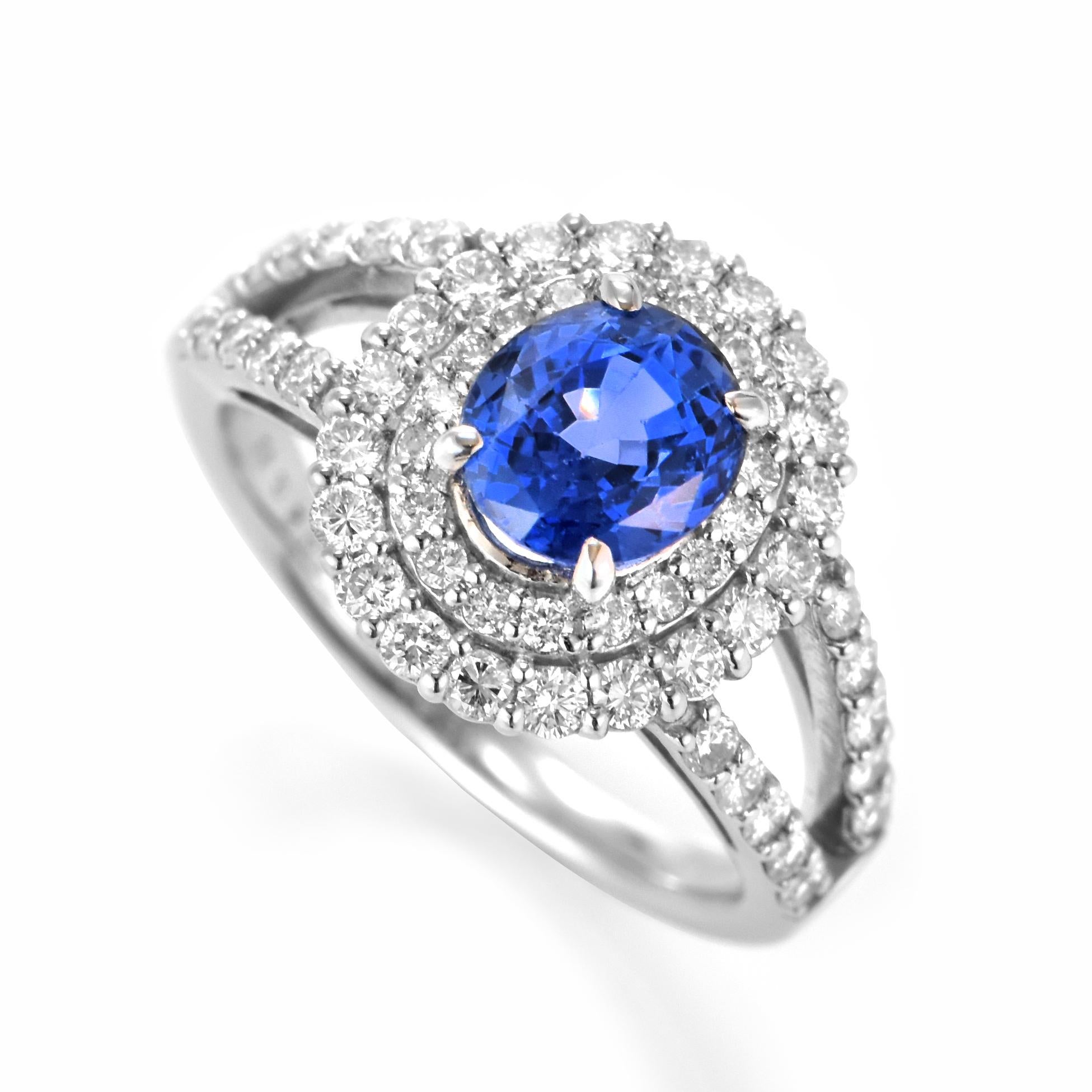 A beautiful ring featuring a GIA Certified 2.03 Carat Natural Unheated Sapphire and 0.85 Carats Diamond Accents set in Platinum. Sapphires have extraordinary durability - they excel in hardness as well as toughness and durability making them very