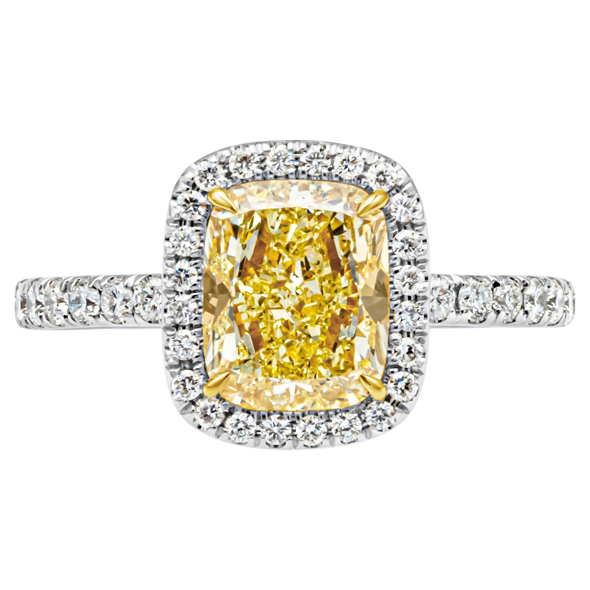 GIA Certified 2.03 Carats Cushion Cut Fancy Yellow Diamond Halo Engagement Ring For Sale
