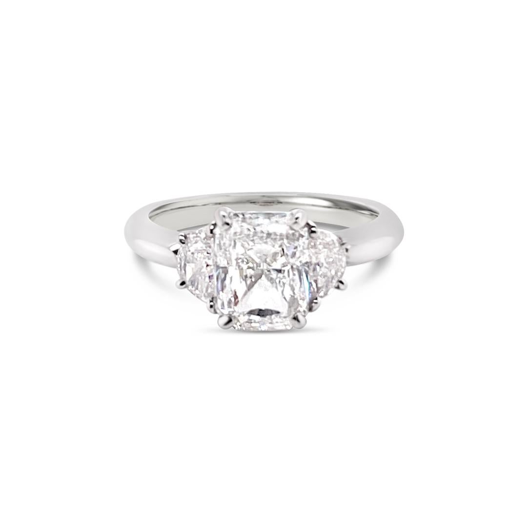 GIA Certified 2.03 Carats Radiant Cut Diamond Ring set with 0.51 Carat (total weight) half moon diamonds.  Center stone is certified as Color G and Clarity VS-1.  Set in Platinum. 

