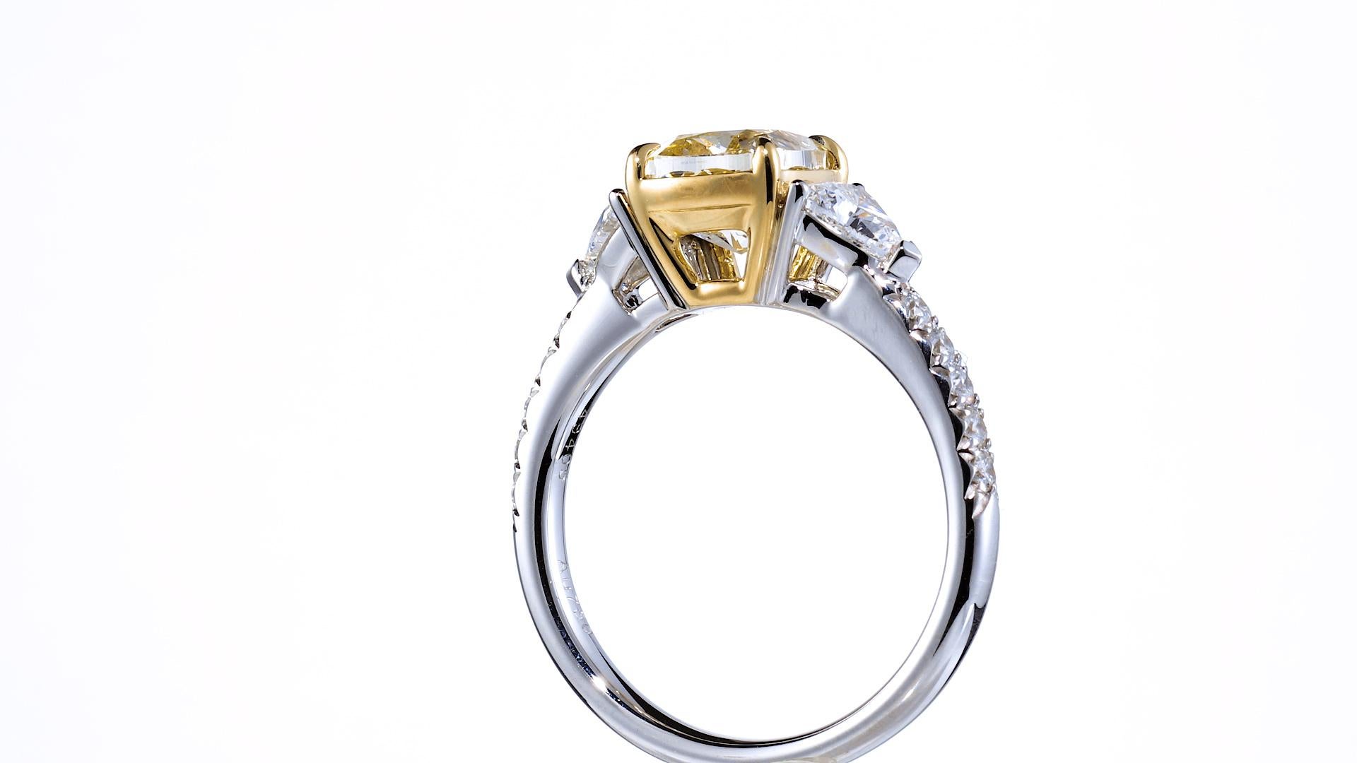 GIA Certified 2.03ct Cushion Cut Natural Fancy Light Yellow Diamond Ring 18KT. For Sale 1