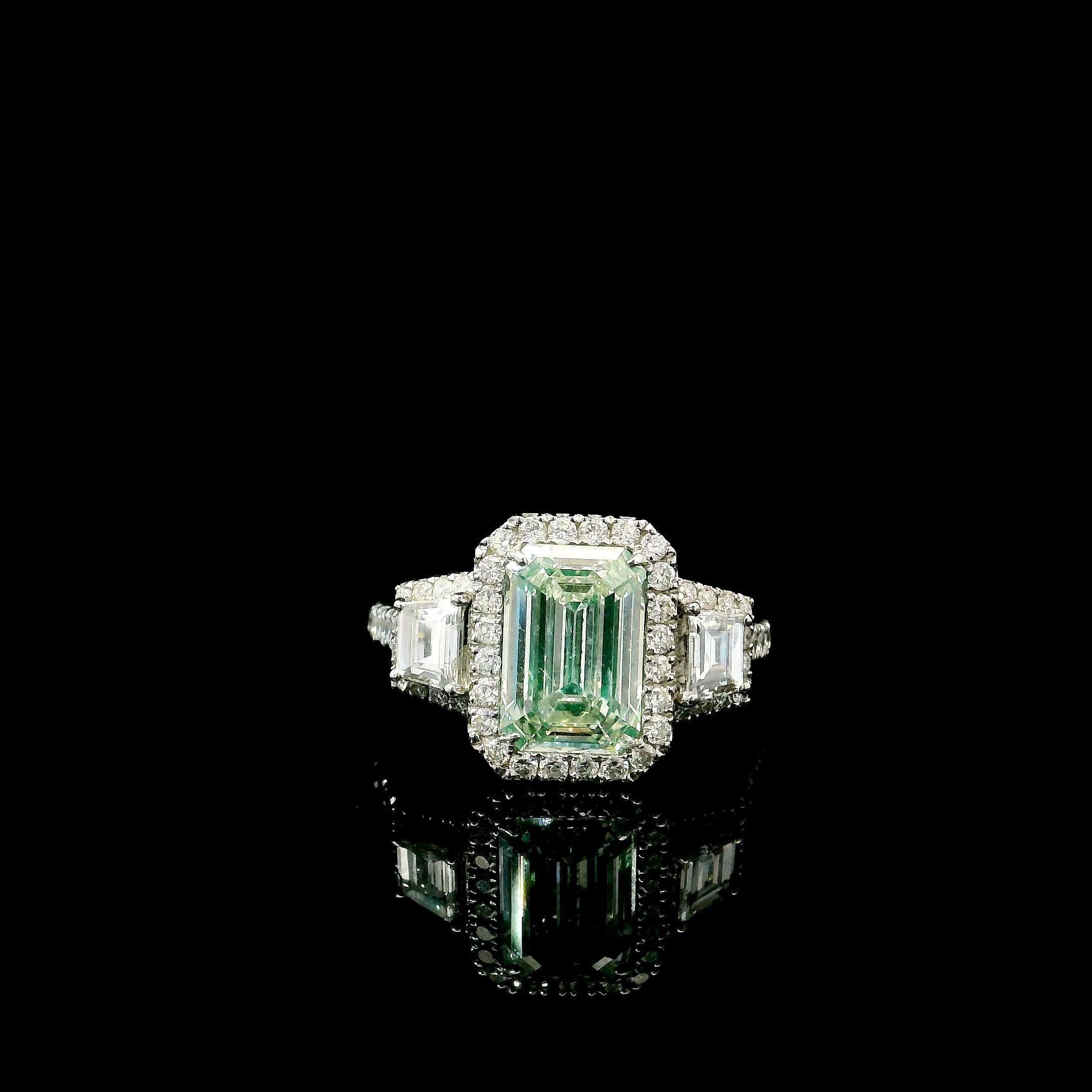 18kt white gold ring with diamonds
  
  Gold colour & karat: White gold 18kt
  Weight: 4.191 grams
  
  Set with-
  Stone type: Diamonds
  Shape: Emerald
  Carat: 2.04 ct
  Colour: Light Green Yellow 
  Clarity: I1
  
  Surrounding Stones: Diamonds
