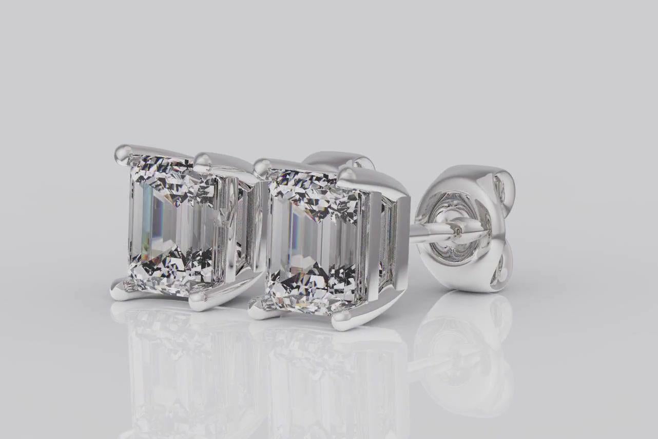 Contemporary GIA Certified 2.05 Carat Emerald Cut Diamond Stud Earrings 14 Karat White Gold For Sale