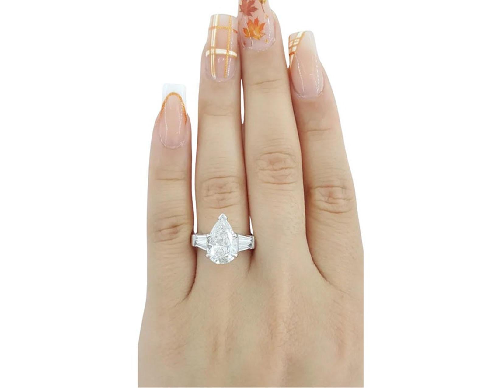 Women's or Men's GIA Certified 2.05 Carat Pear Shape Diamond Platinum Ring with Tapered Baguette For Sale