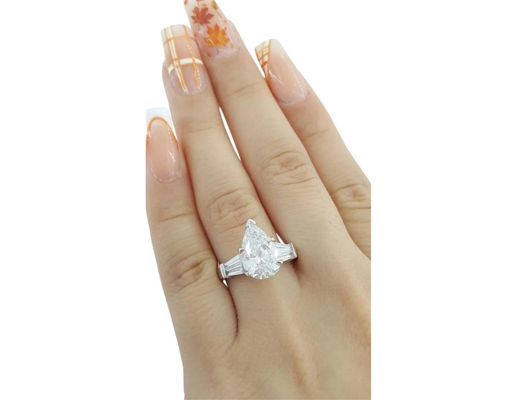 GIA Certified 2.05 Carat Pear Shape Diamond Platinum Ring with Tapered Baguette For Sale 1