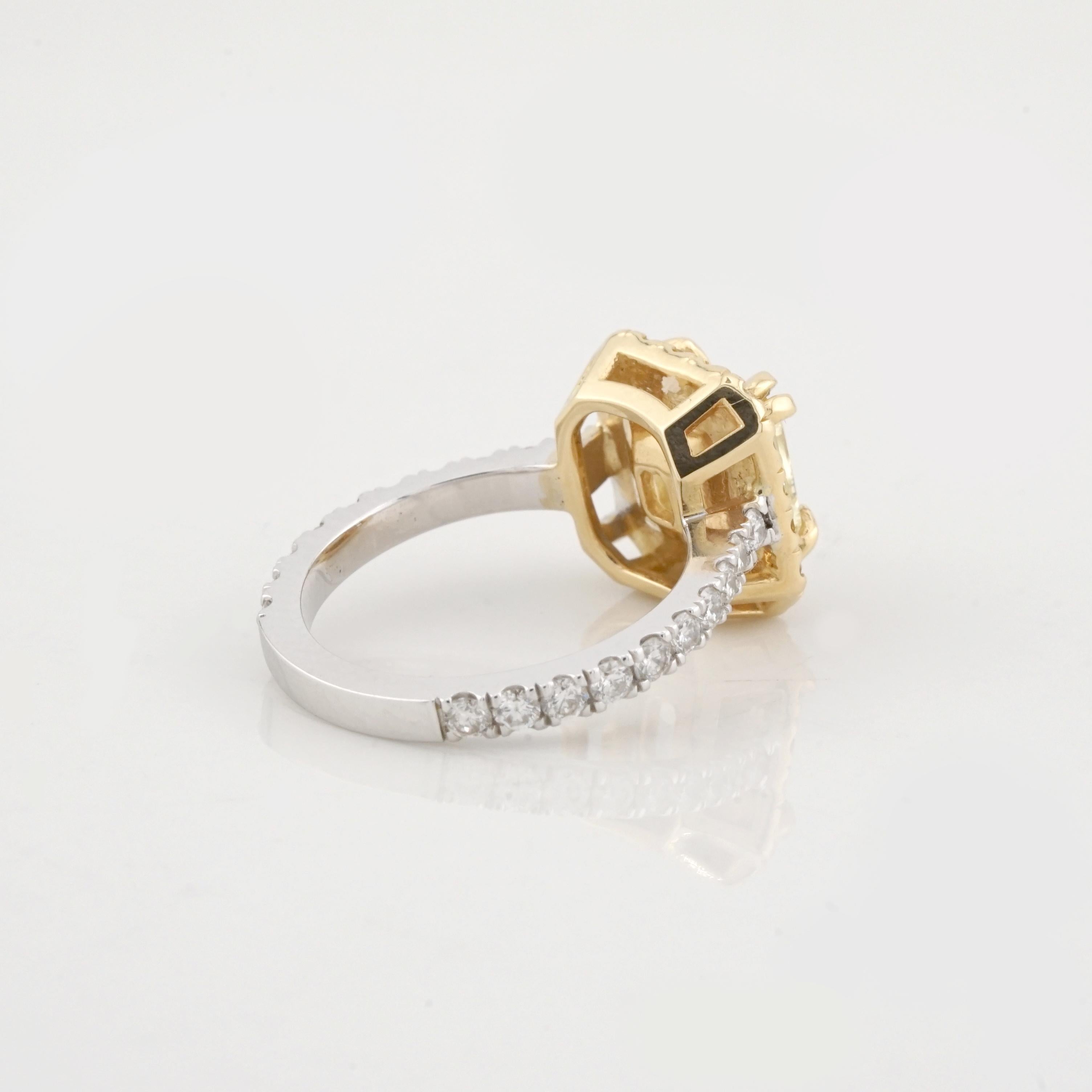 GIA Certified 2.05 Carat Radiant Cut Fancy Yellow Diamond Ring In New Condition For Sale In Chicago, IL