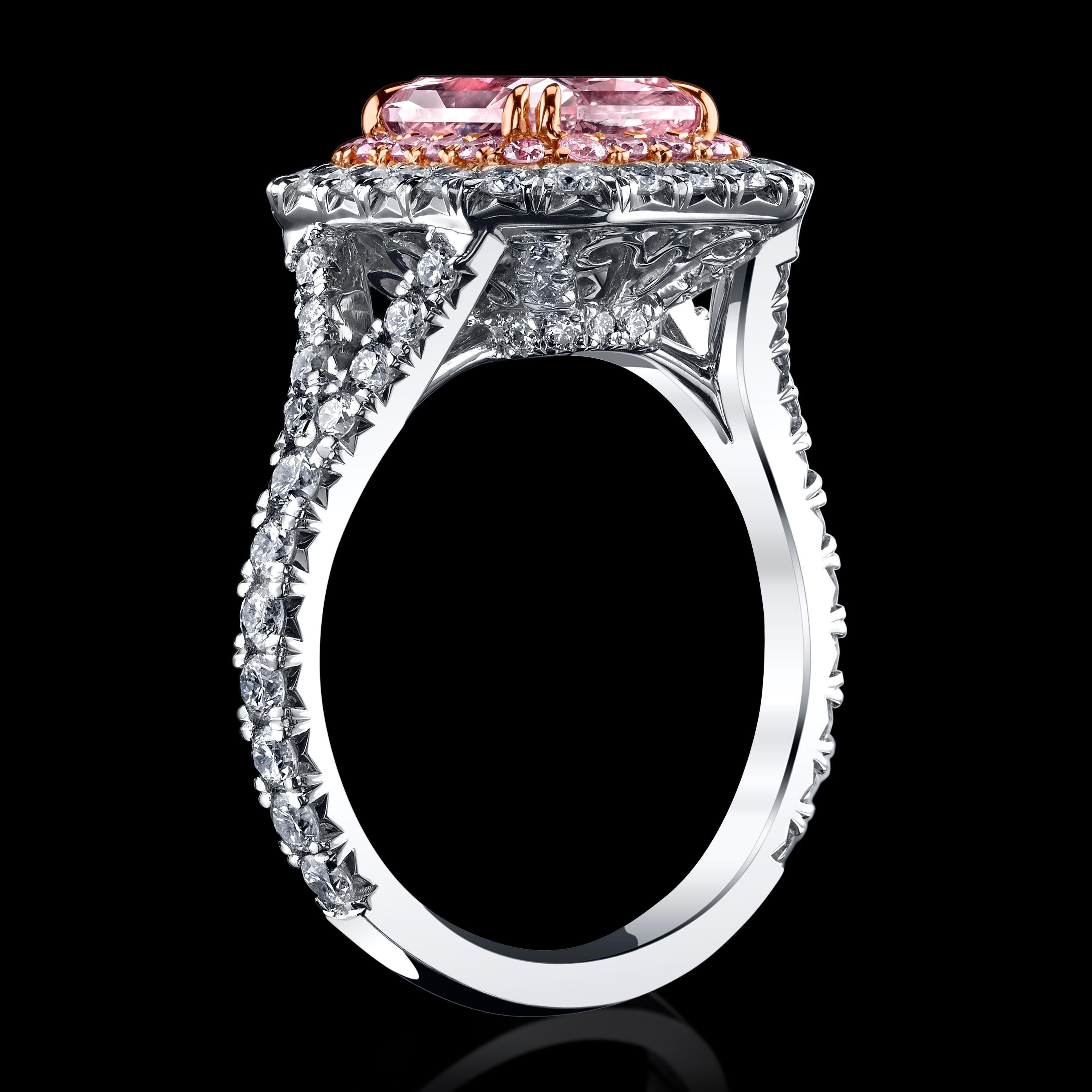 The shade of diamond color mimics a strong Californian sunset. 

A lovely 2.05ct Radiant Fancy Light Orangy Pink SI2 Natural diamond halo ring set in platinum & 18K White Gold with an array of beautiful pink and colorless natural diamonds totaling
