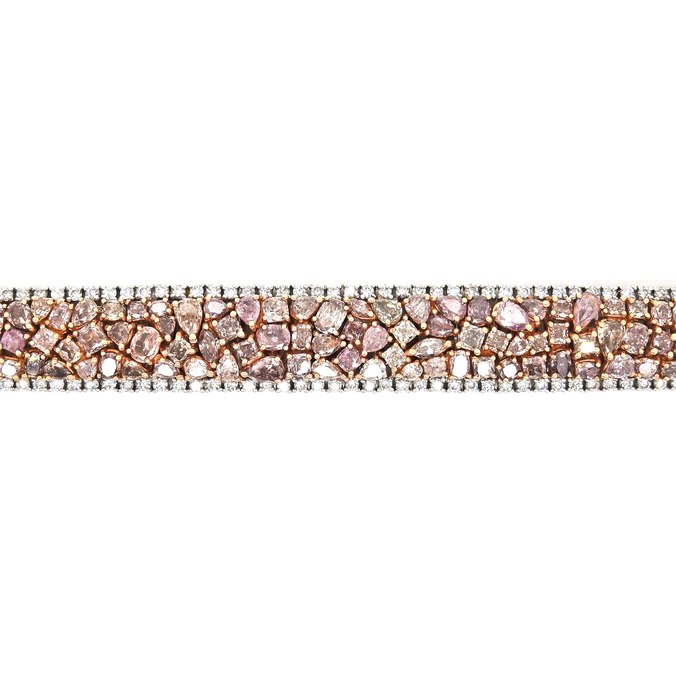 434 Fancy Diamonds: 20.68 Carats
Metal: 18K White and Yellow Gold, 72.30 Grams
GIA Certificate # 2155933300