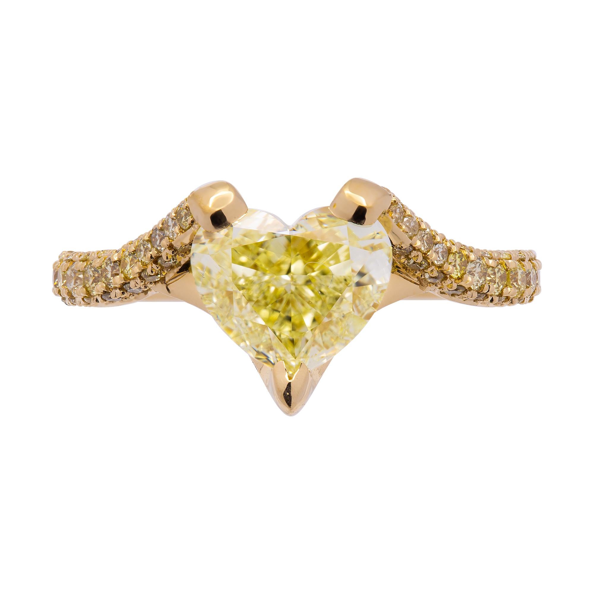 This is ring is a true masterpiece! A real rare find center stone Natural Fancy Color Diamond is unique and special, definitely one of a kind. 
Exclusive Hight End Piece! 
Very vibrant and Vivid color Heart Shaped 2.06CT Center is Natural Fancy