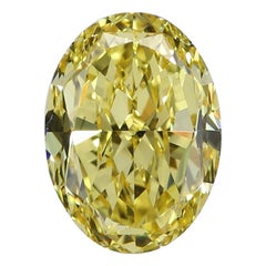 GIA Certified 2.07 Carat Natural Fancy Vivid Yellow VVS1 Oval Cut Diamond