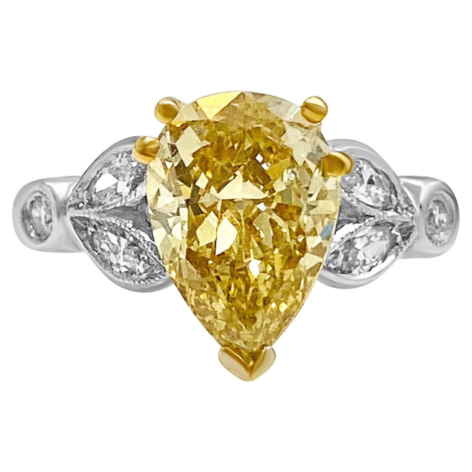 GIA Certified 2.07 Carat Pear-Shape Fancy Yellow & White Diamond Platinum Ring For Sale