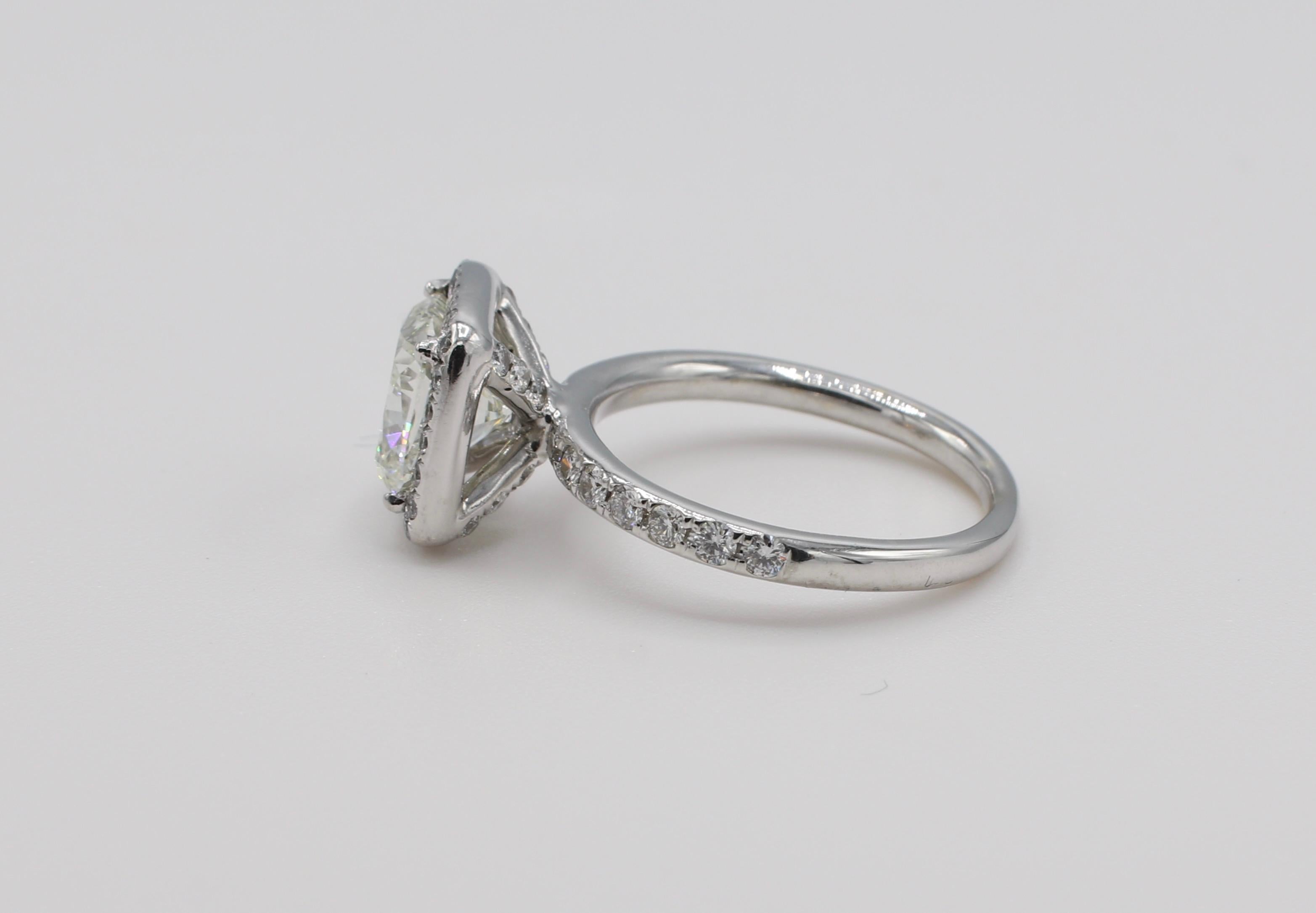 GIA Certified 2.08 Carat Cushion Diamond Halo Platinum Engagement Ring In Excellent Condition In  Baltimore, MD