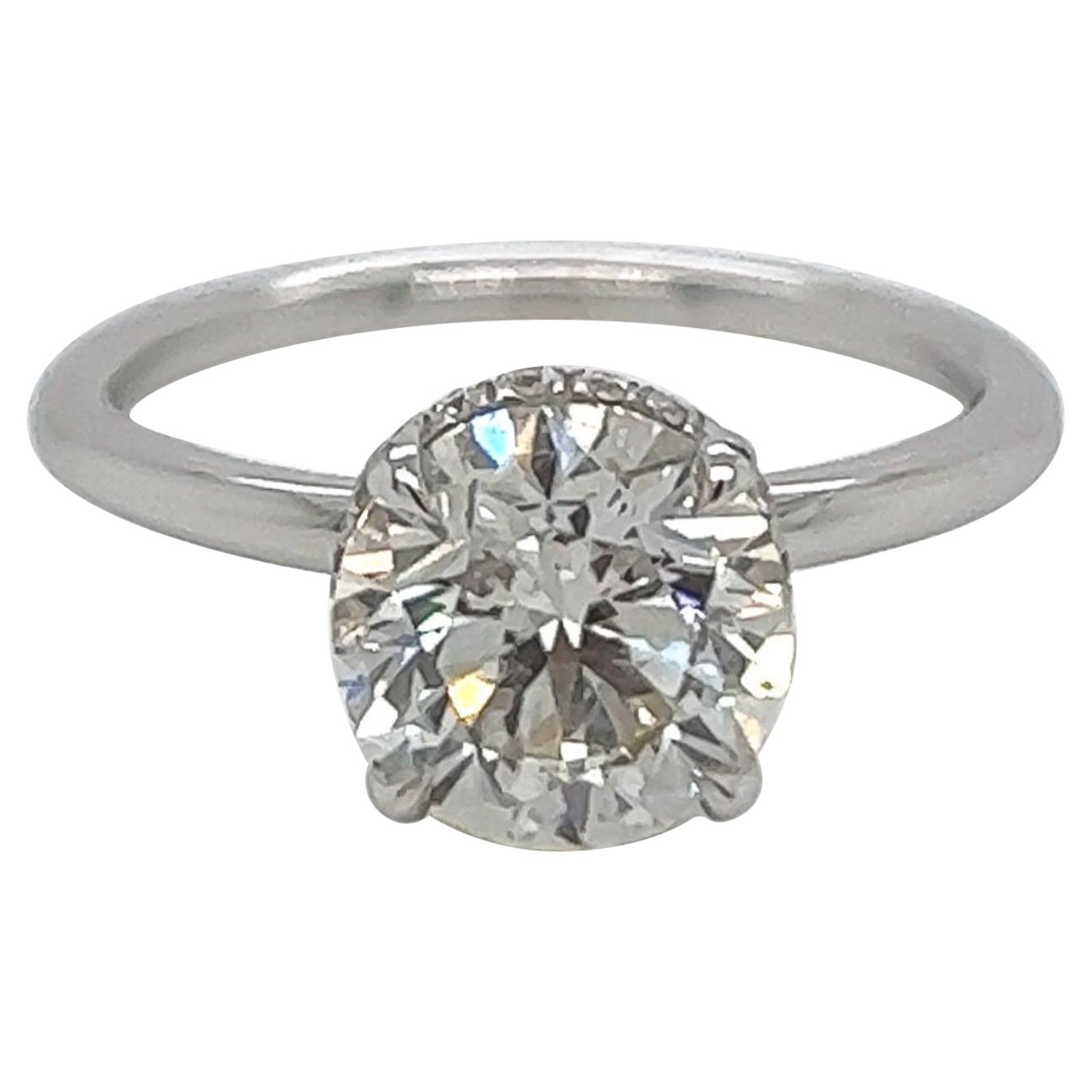 GIA Certified 2.09 Carat Contemporary Halo Natural Diamond Engagement Ring For Sale