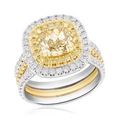GIA Certified 2.09 Carat Cushion Fancy Yellow Diamond Halo Ring