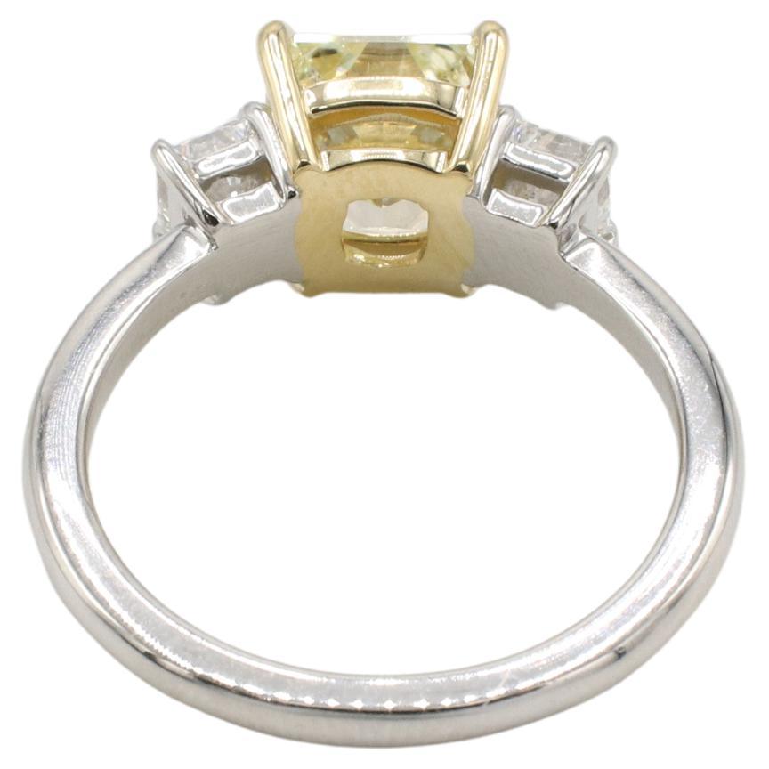 Modern GIA Certified 2.09 Light Yellow Three-Stone Natural Diamond Engagement Ring For Sale