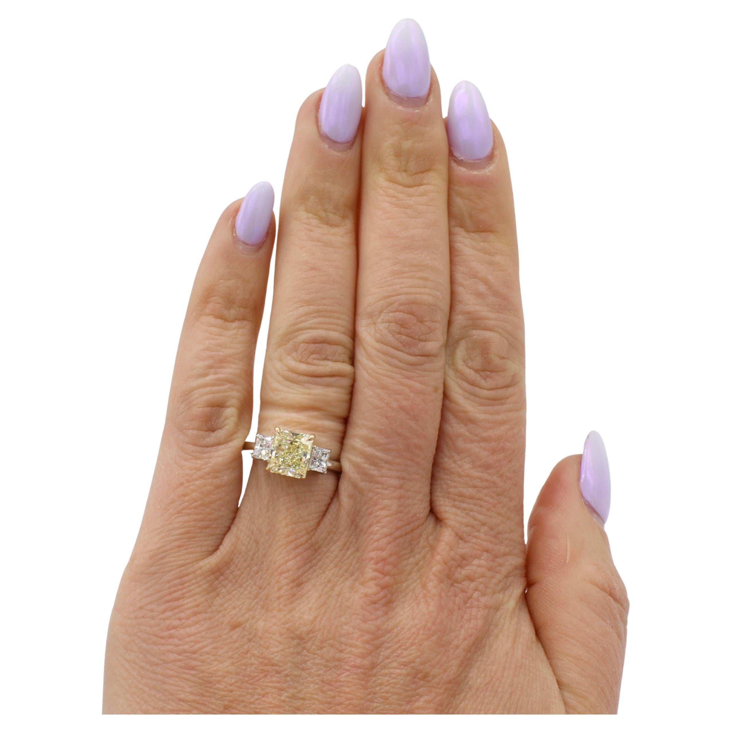 Radiant Cut GIA Certified 2.09 Light Yellow Three-Stone Natural Diamond Engagement Ring For Sale