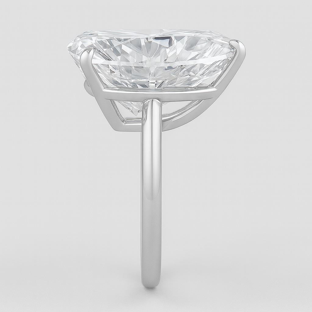 Cette pièce extraordinaire met en valeur un magnifique diamant brillant de 21,35 carats certifié par le GIA, de couleur D et de pureté VS1. Cette pierre précieuse exceptionnelle présente une combinaison parfaite de rareté, de beauté et de brillance,