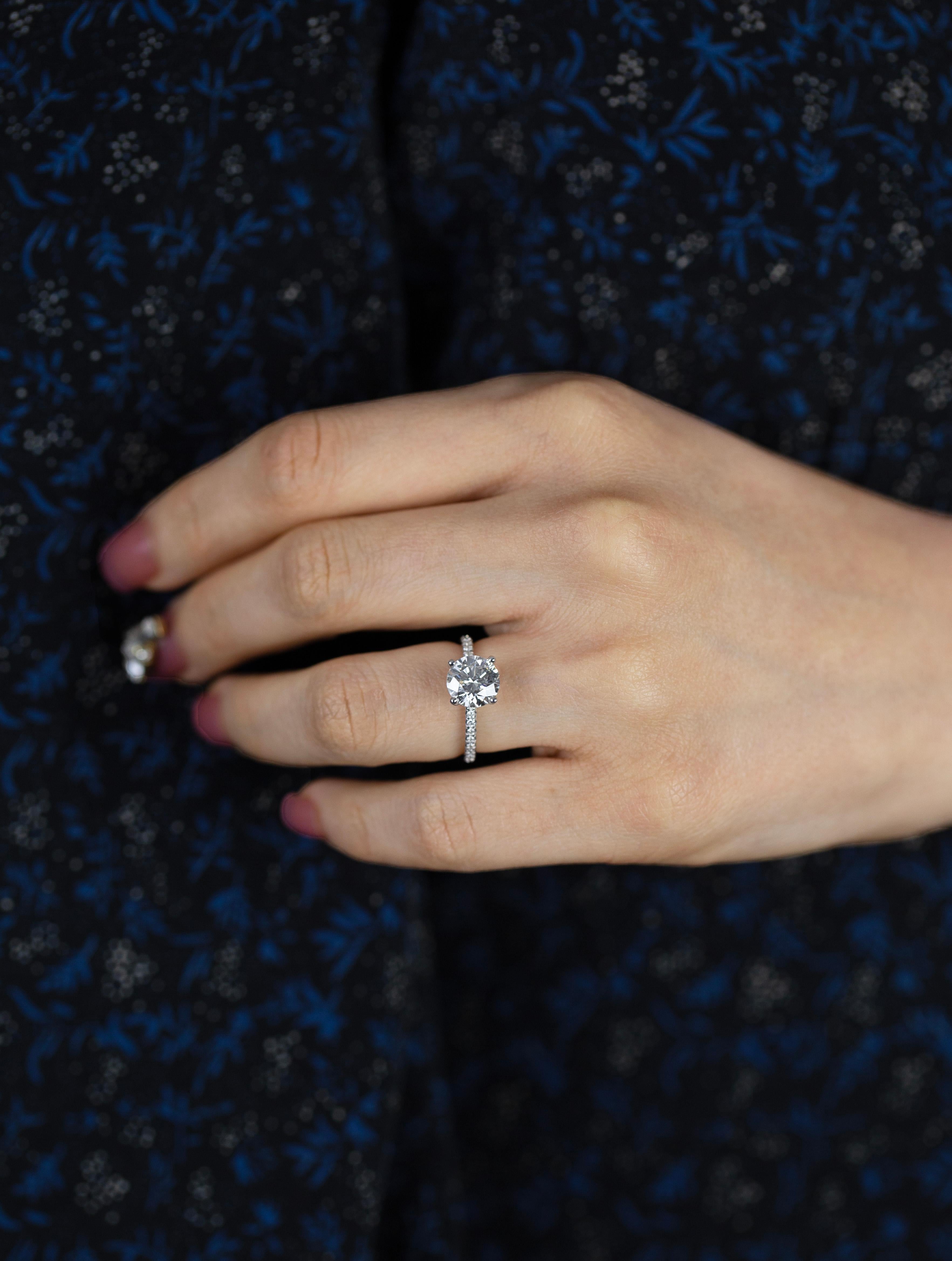 round cut halo engagement rings