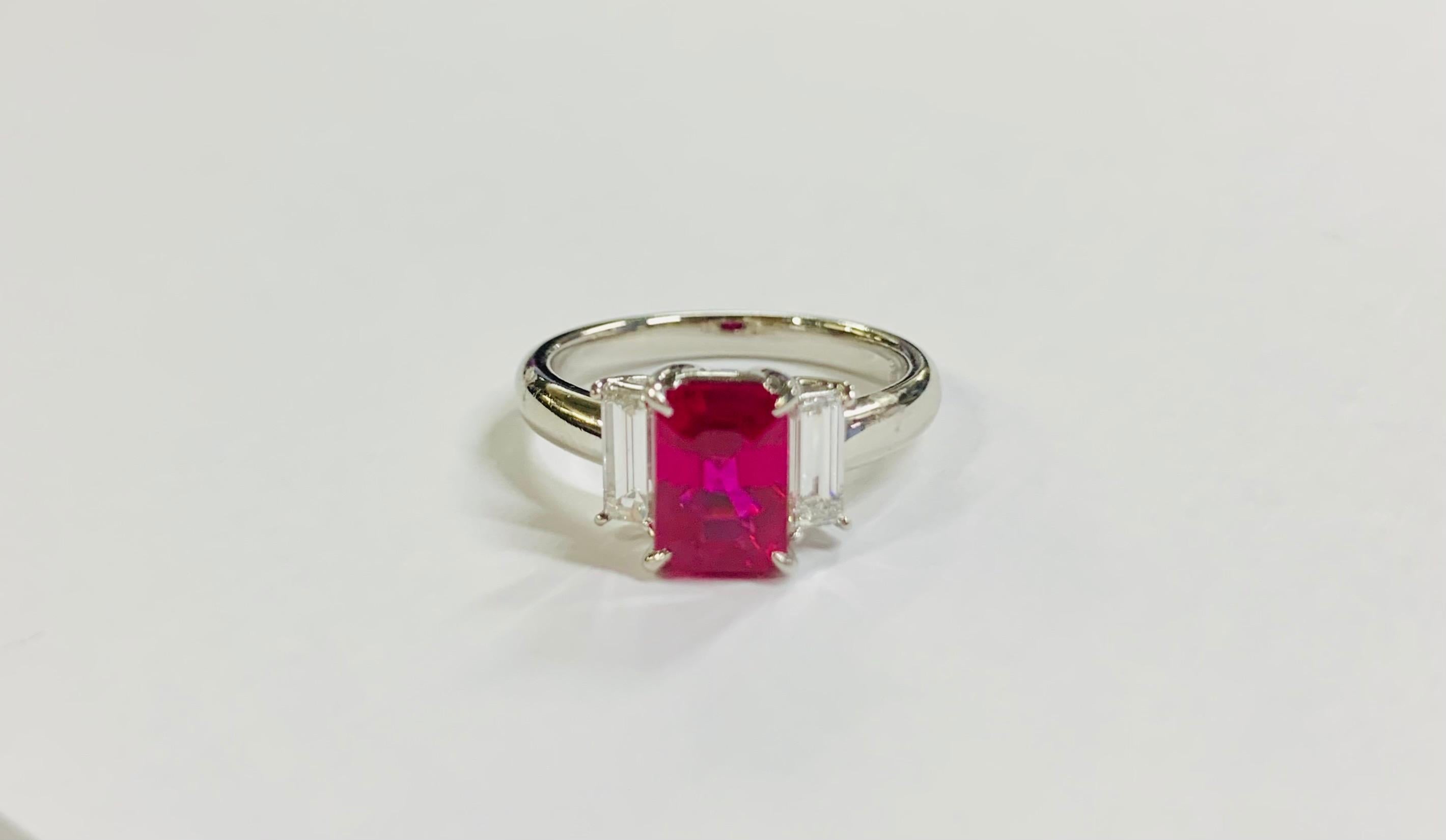 Natural Burmese Ruby and Diamond Ring with GIA Certification

Stones: Burma Ruby GIA Certified 
Stone Shape: Step Cut
Stone Carat: 2.11 Carat
Stone: Natural Corundum
Side Stones: Diamonds 
Stone Shape: Baguette Diamonds
Stone Color: G
Stone Clarity: