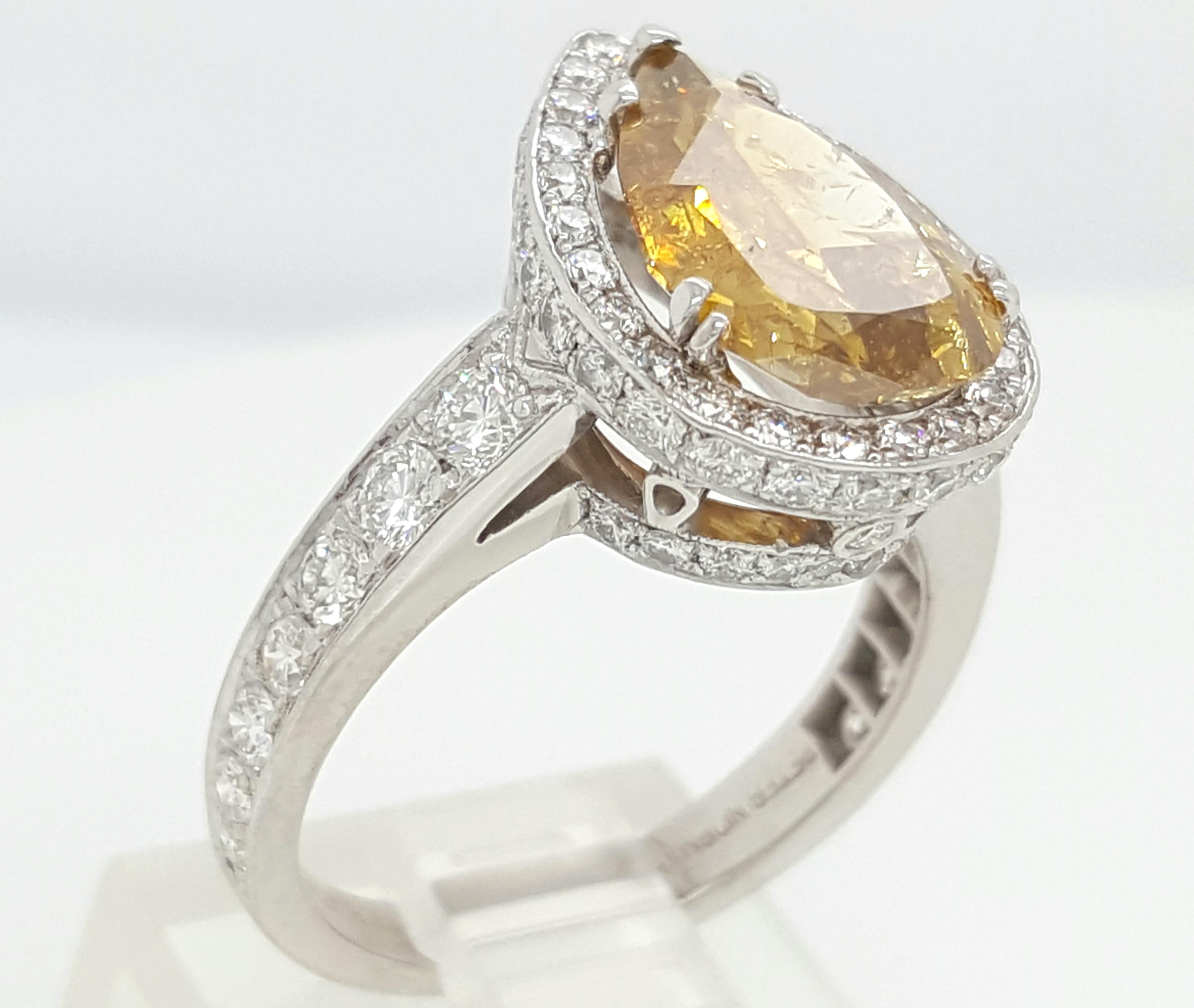GIA Certified 2.12 Carat Fancy Yellow Pear Diamond Ring In New Condition In Addison, TX