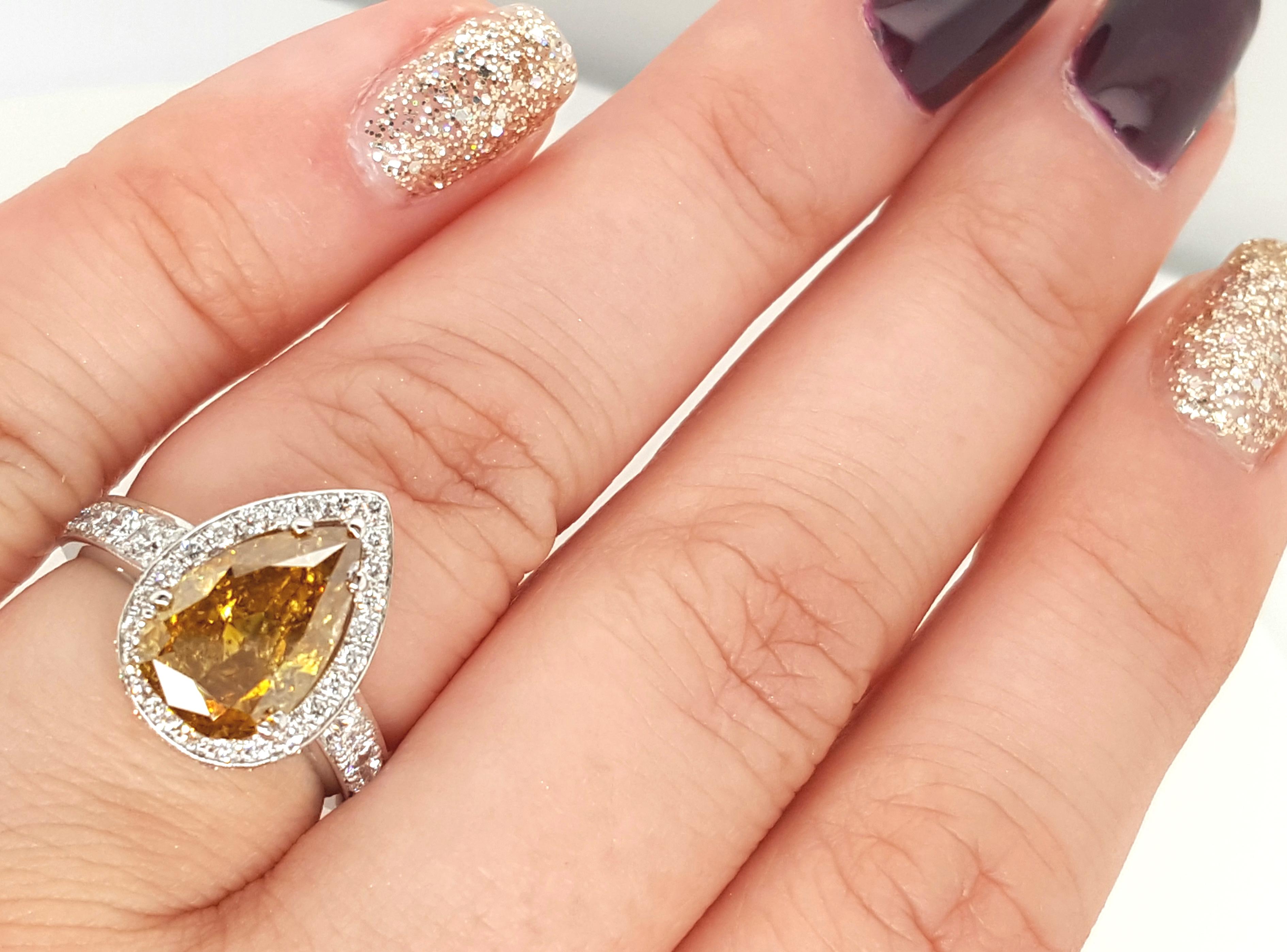 Women's GIA Certified 2.12 Carat Fancy Yellow Pear Diamond Ring