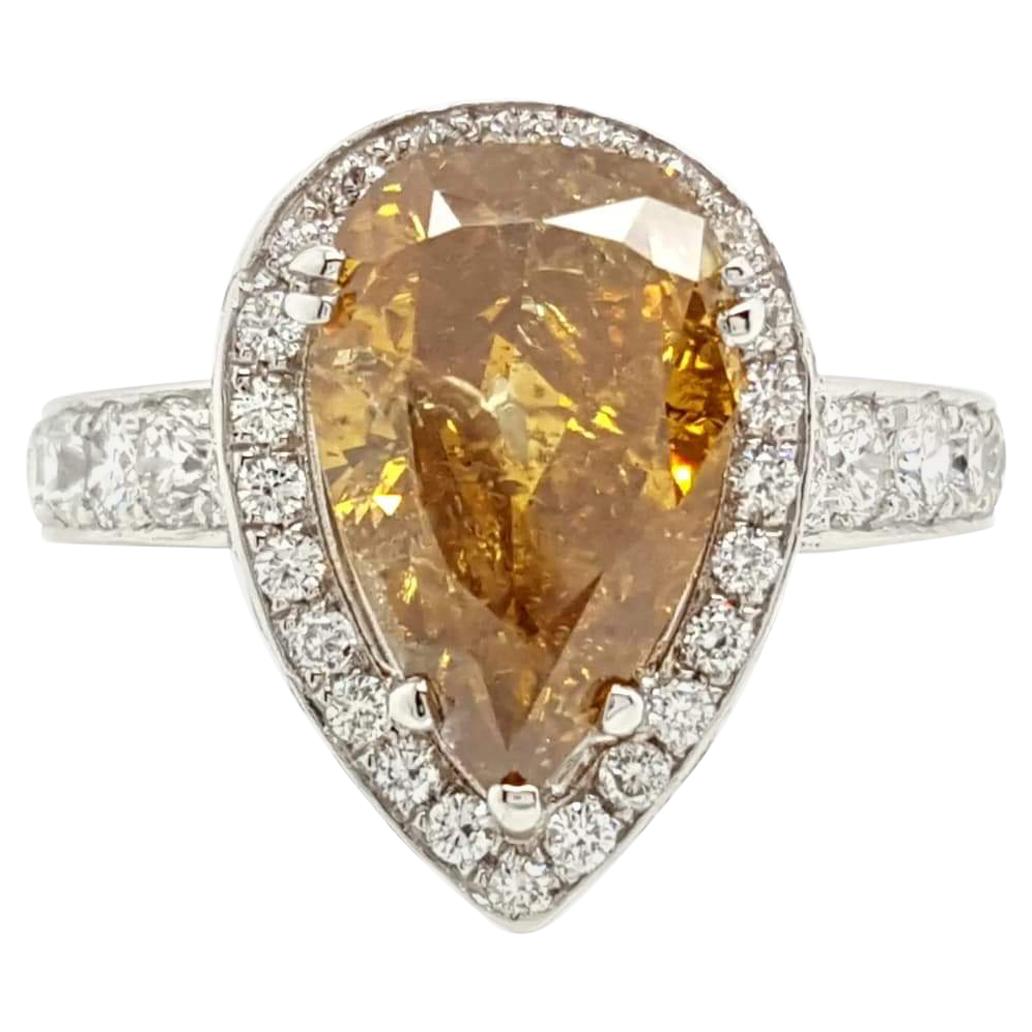 GIA Certified 2.12 Carat Fancy Yellow Pear Diamond Ring