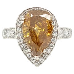 GIA Certified 2.12 Carat Fancy Yellow Pear Diamond Ring