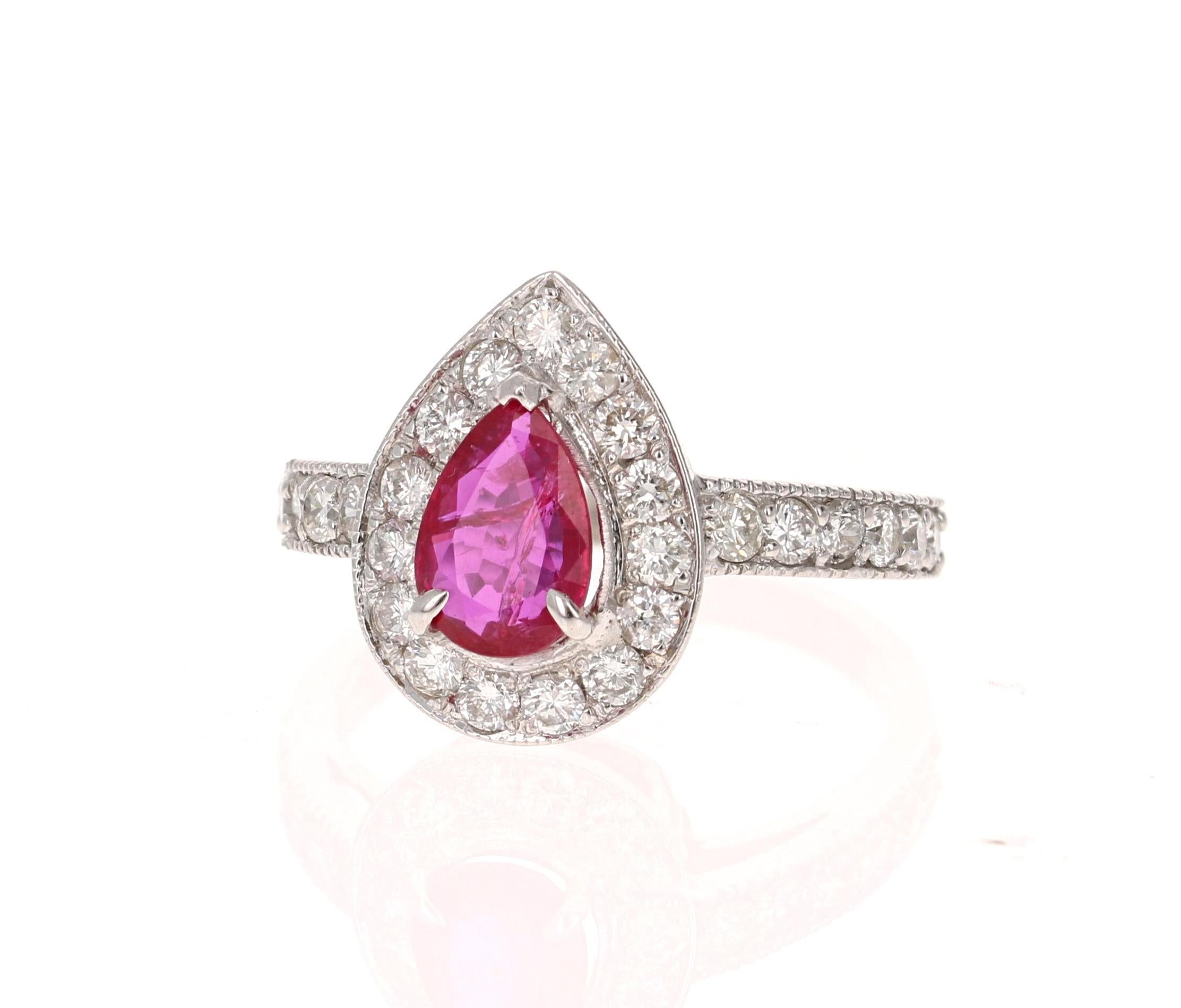 GIA Certified - Natural, Unheated Ruby and Diamond Ring in 18 Karat White Gold
This ring has a gorgeous Pear Cut Ruby set in the center of the ring.  The Ruby has origins from Southern Africa (Republic of Mozambique) and is 1.10 carats. It has a