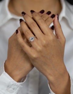 GIA Certified 2.12 Carats Emerald Cut Diamond Three-Stone Engagement Ring