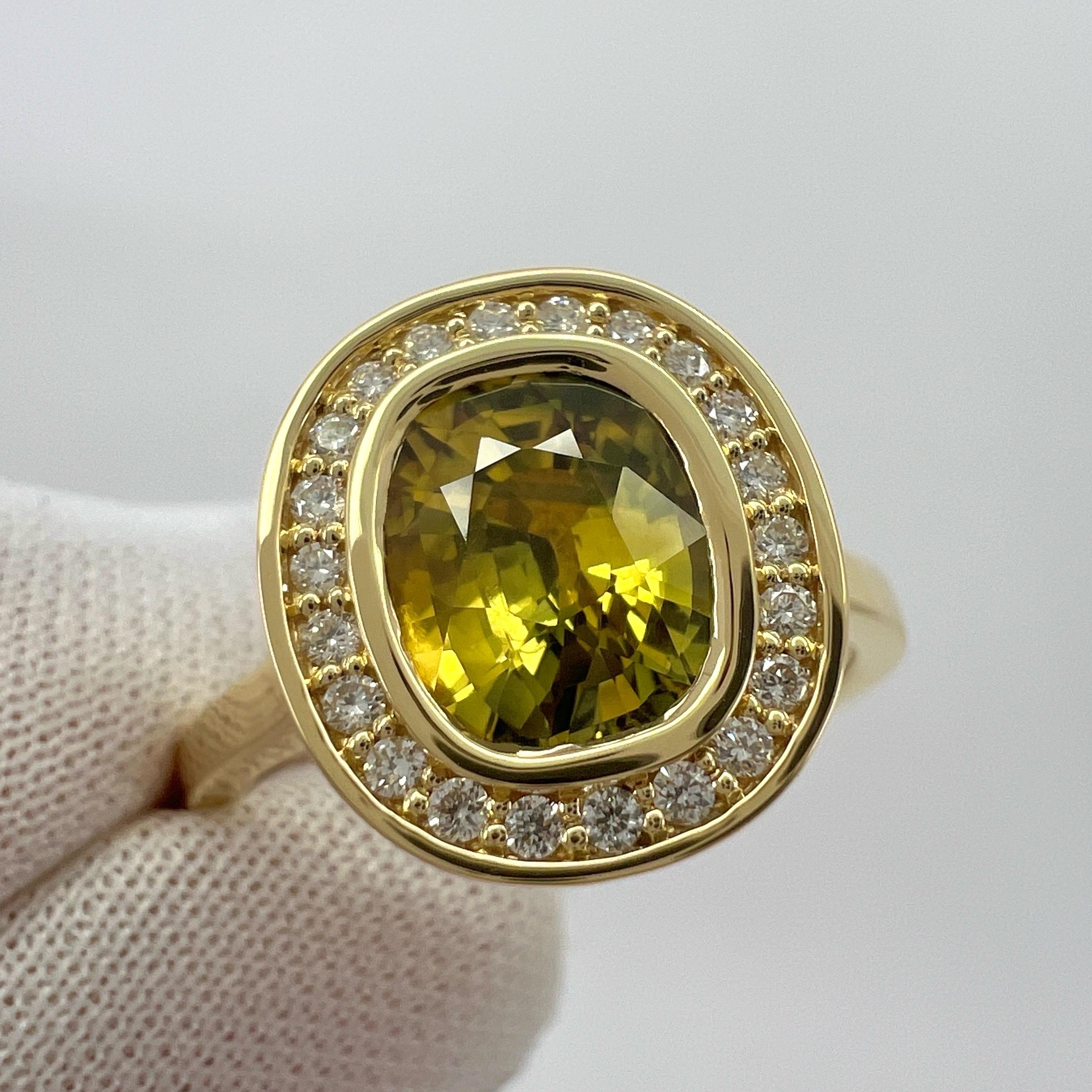 Unique GIA Certified Untreated Vivid Yellow Sapphire & Diamond 18k Yellow Gold Halo Ring

Fine 2.12 carat natural sapphire with a fine vivid yellow colour and an excellent oval cut. This sapphire is fully certified by GIA confirming the sapphire as