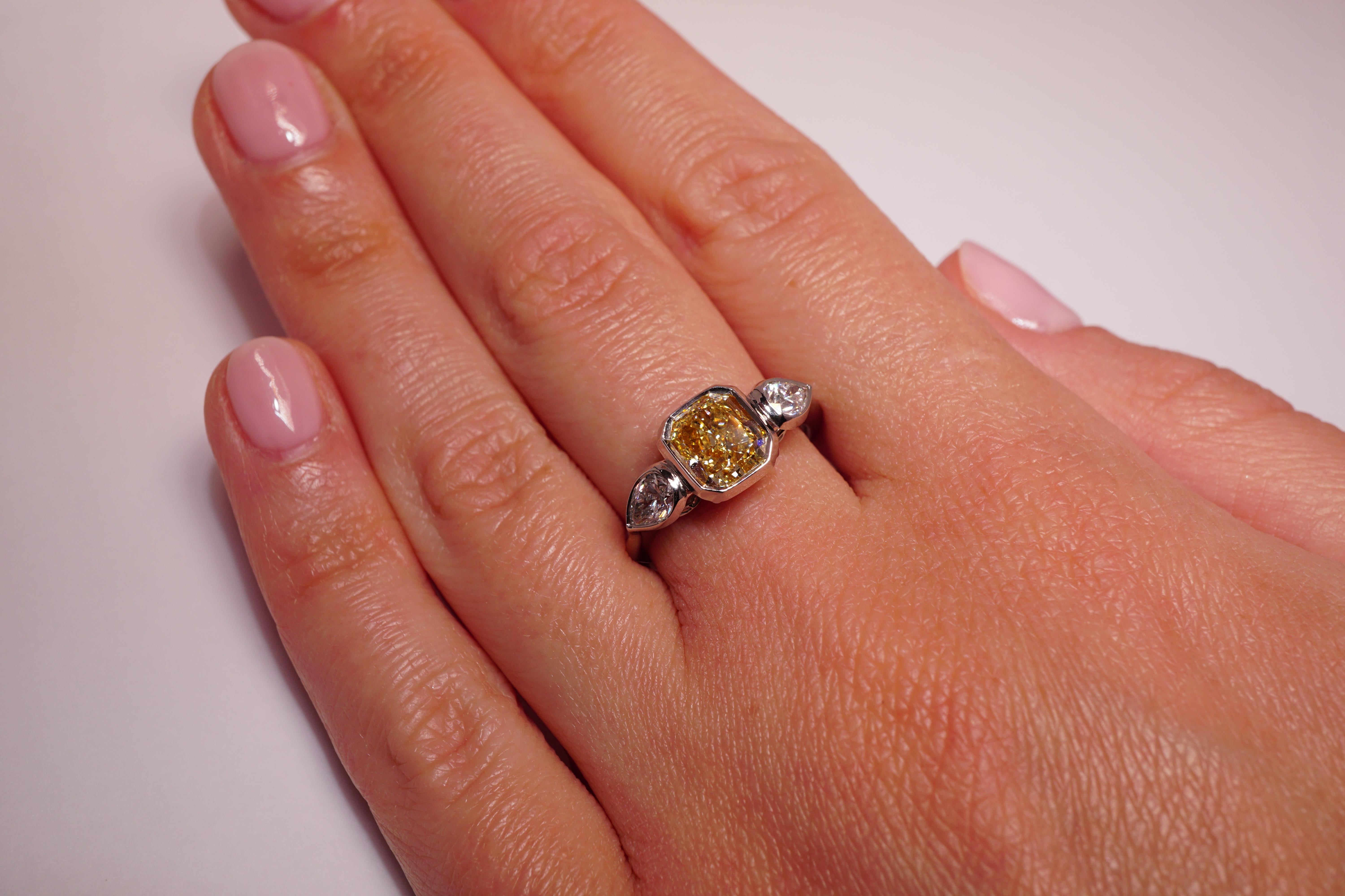 GIA Certified 1.63 Ct Radiant Fancy Light Yellow Diamond Engagement Ring In New Condition For Sale In New York, NY