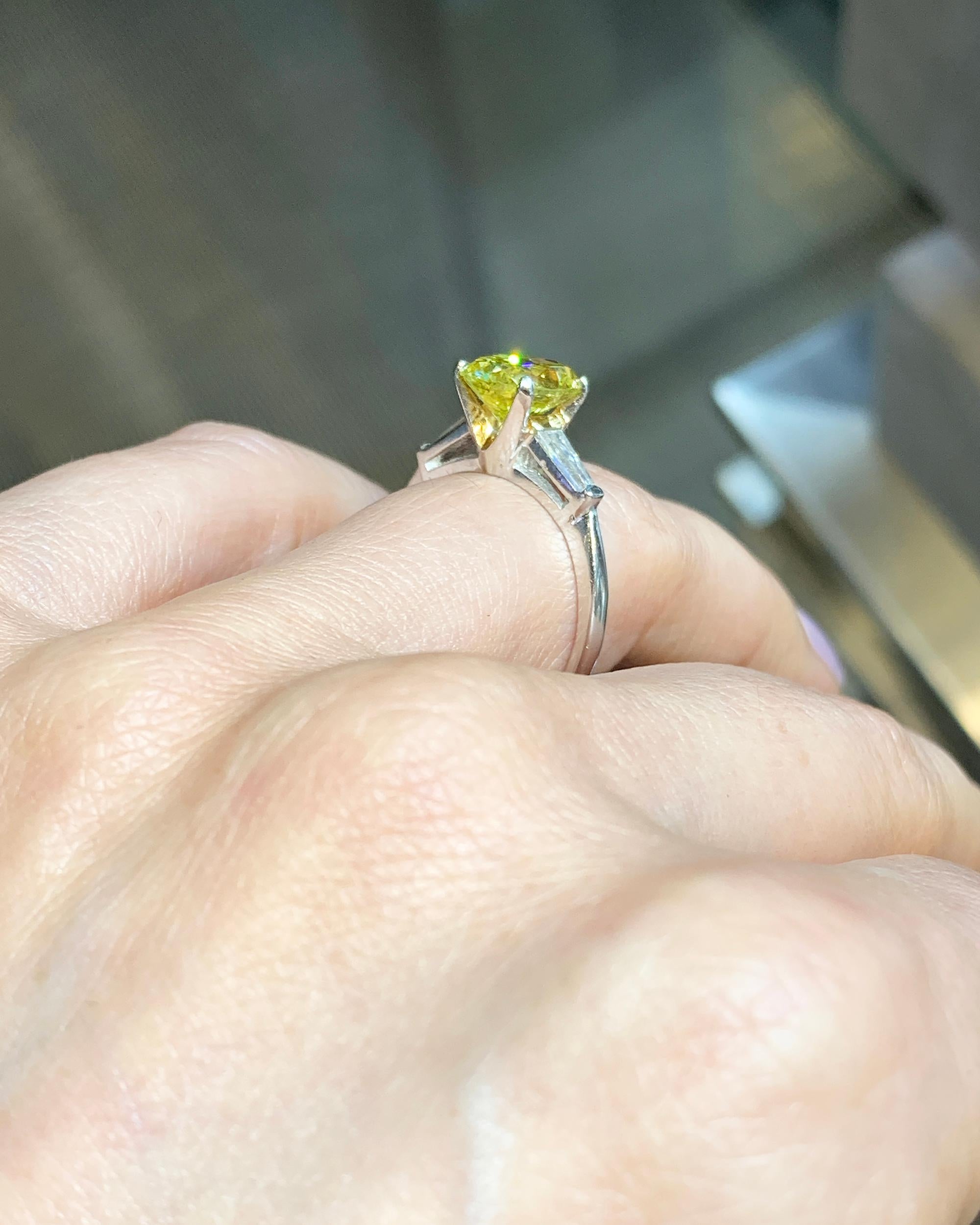 Oval Cut Spectra Fine Jewelry, GIA Certified 2.14 Carat Fancy Vivid Yellow Diamond Ring For Sale