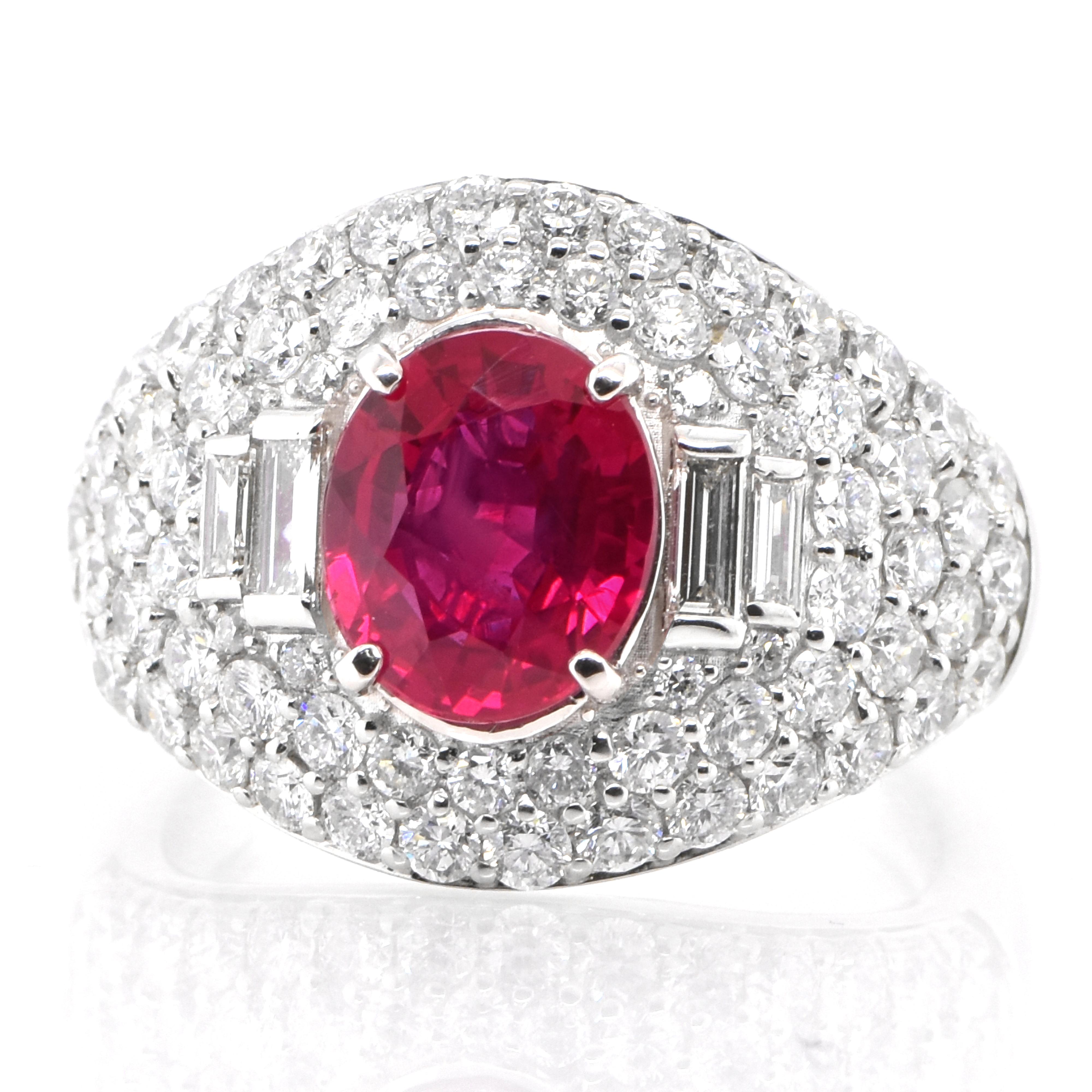 A beautiful ring set in Platinum featuring a GIA Certified 2.15 Carat Natural Burmese Ruby and 1.85 Carat Diamonds. Rubies are referred to as 